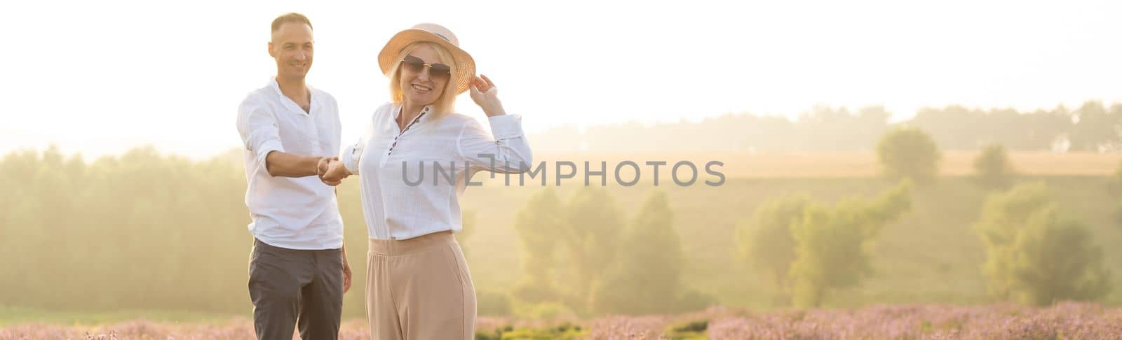 adult couple in the lavender fields.