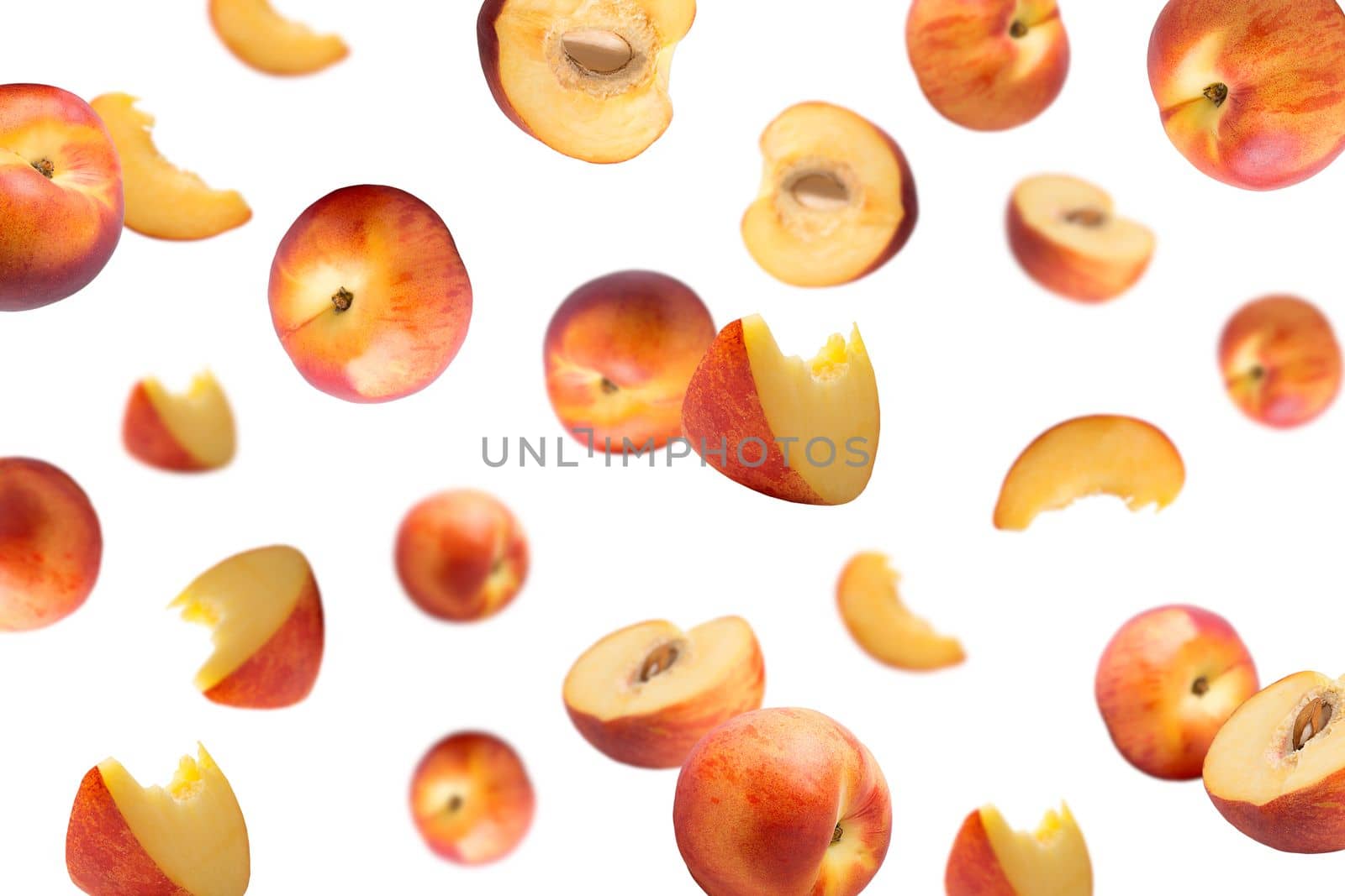 Creative levitation pattern with peach ruits. Selective focus. Isolated fruit. Packaging concept. Clip art image for package design.