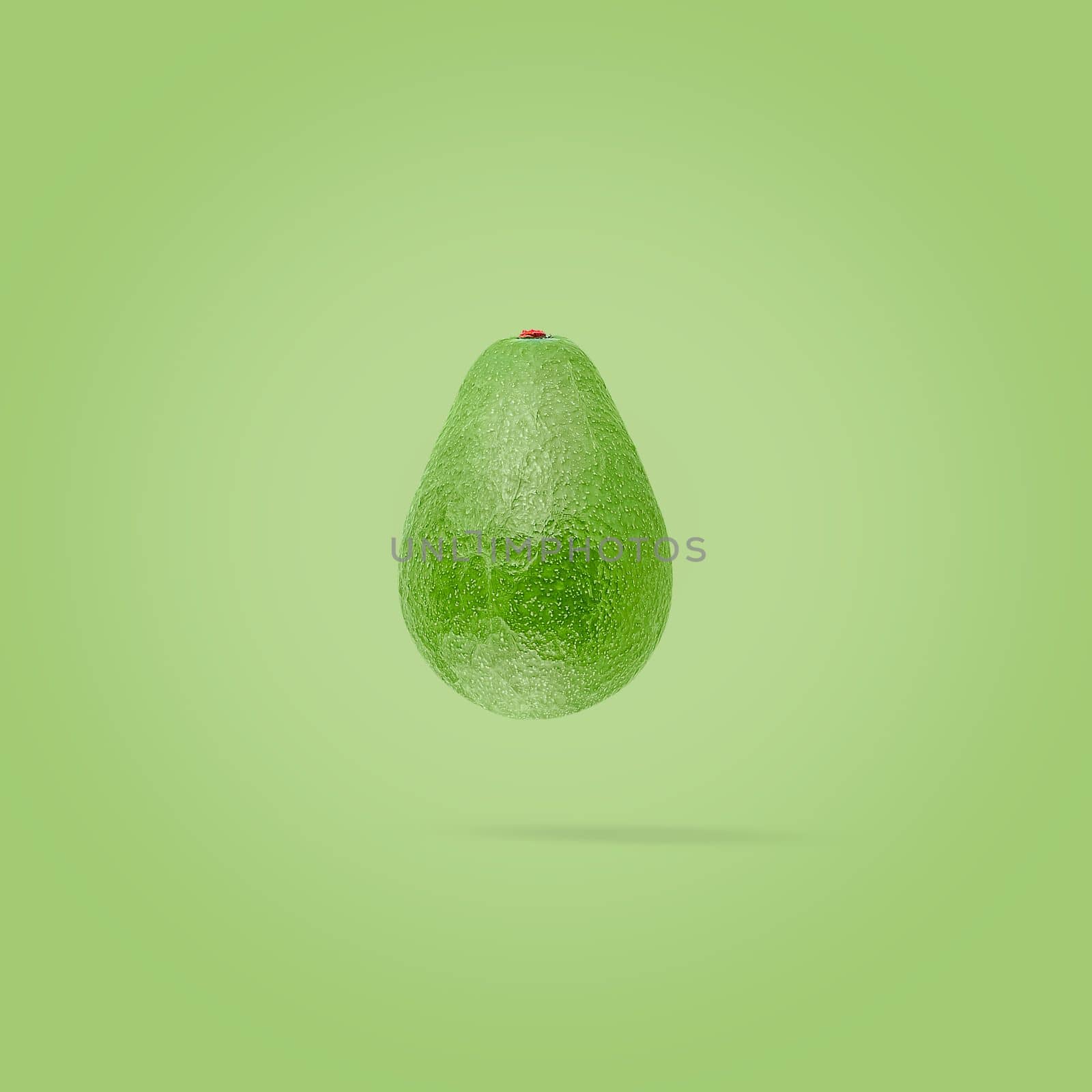 Avocado on creative colored background with clipping path as package design element by Ciorba