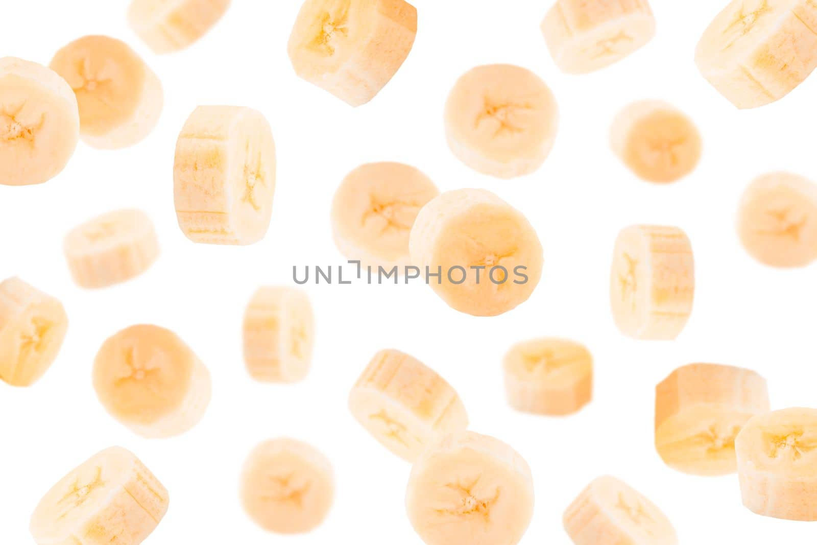 Creative levitation pattern with abananas. Selective focus. Isolated fruits. Packaging concept. Clip art image for package design.