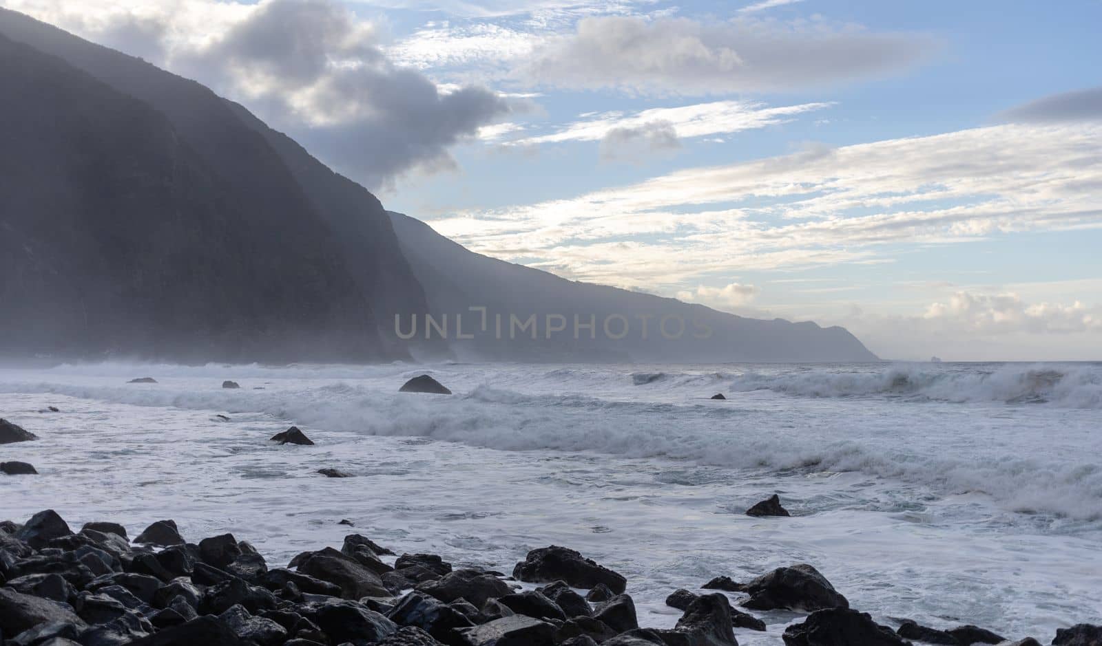 stormy ocean big breaking waves a lot of foam by Chechotkin