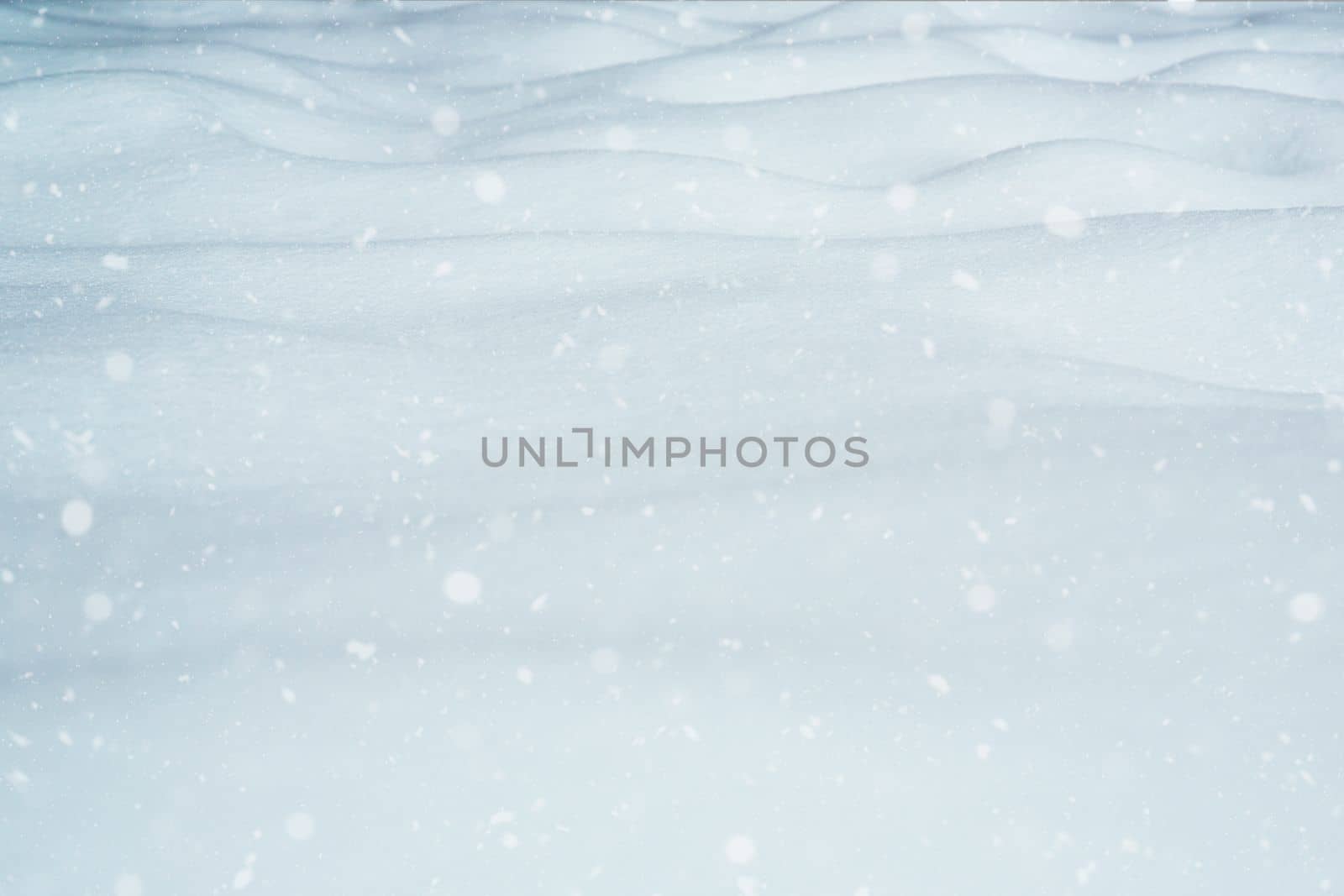 Winter landscape. It's snowing outside. Snowflakes are falling and winter snowdrifts are close. Snow is a natural phenomenon. Copyspace