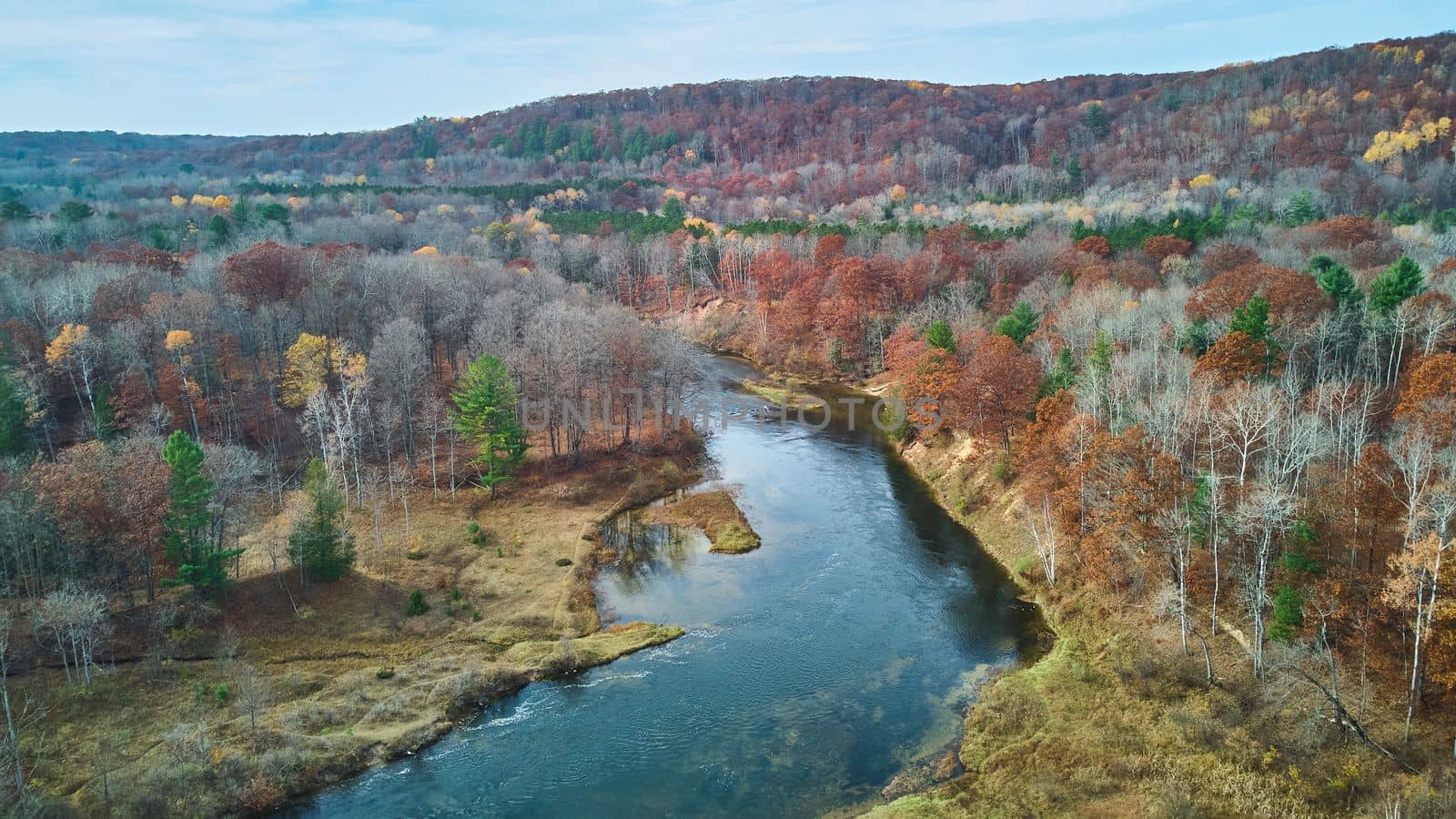 Aerial view over river in late fall of Michigan by njproductions