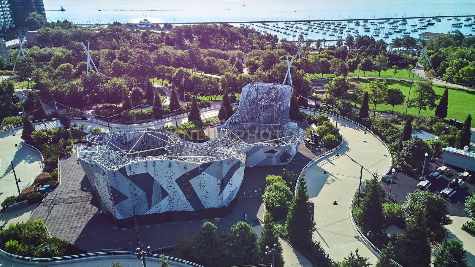 Rock climbing activity center in Millennium Park from above with view of docks and Lake Michigan by njproductions