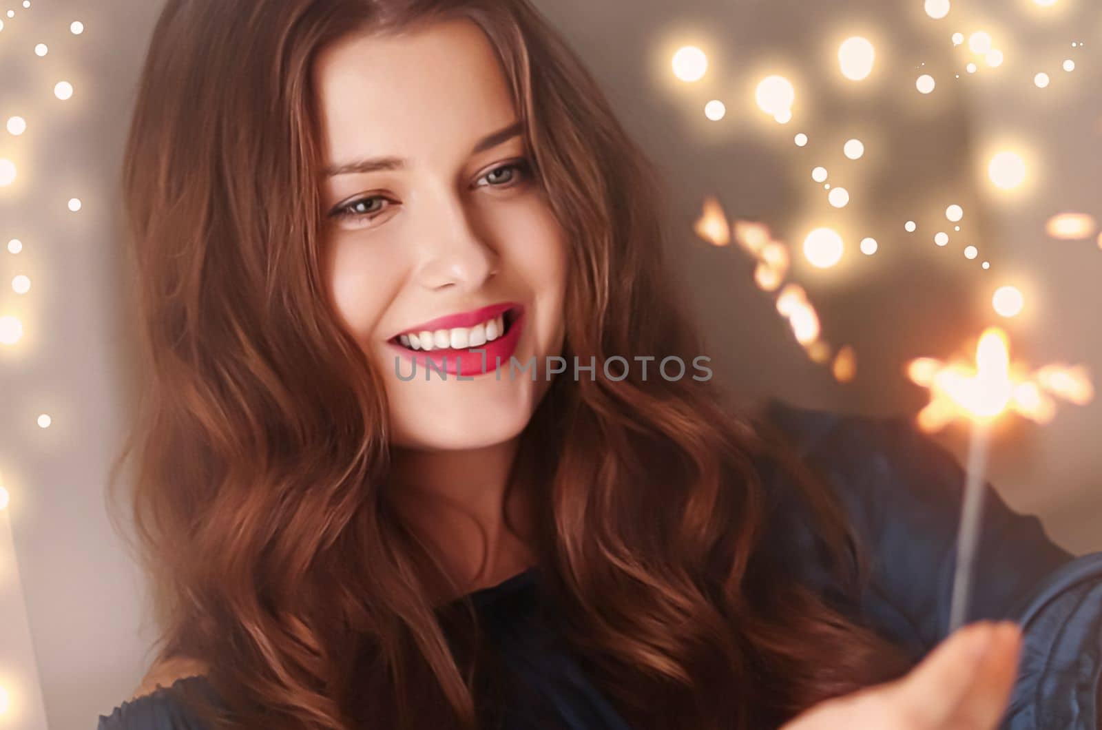 Holiday magic, Christmas and New Year celebration, happy woman with sparklers, portrait