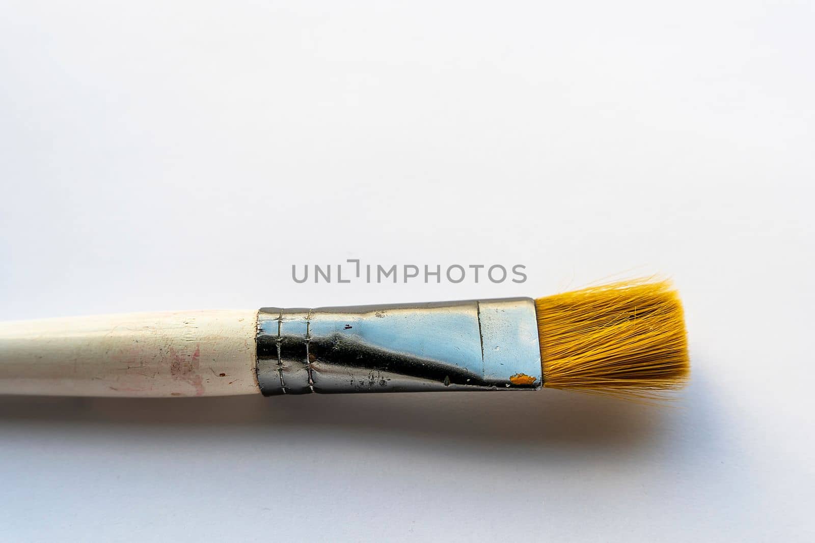 a brush for drawing on a white background. Close-up.
