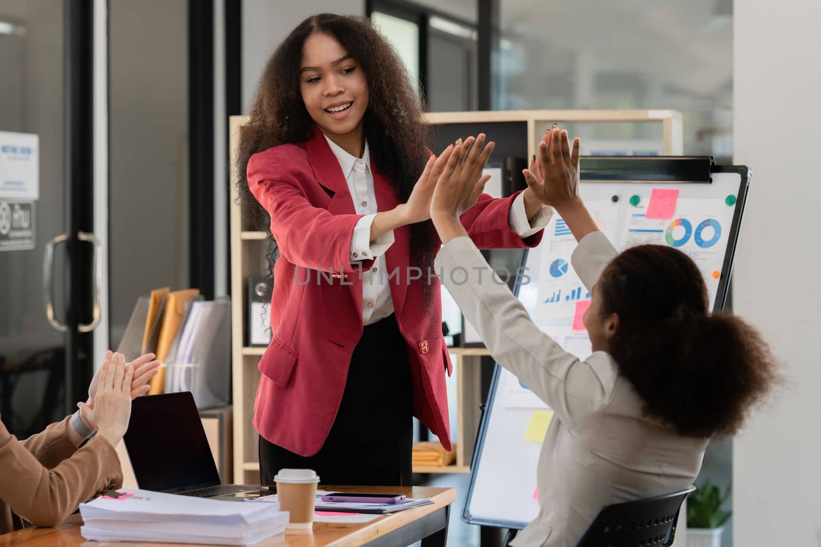 Young African American businesswoman working with partner at office. finance concept.