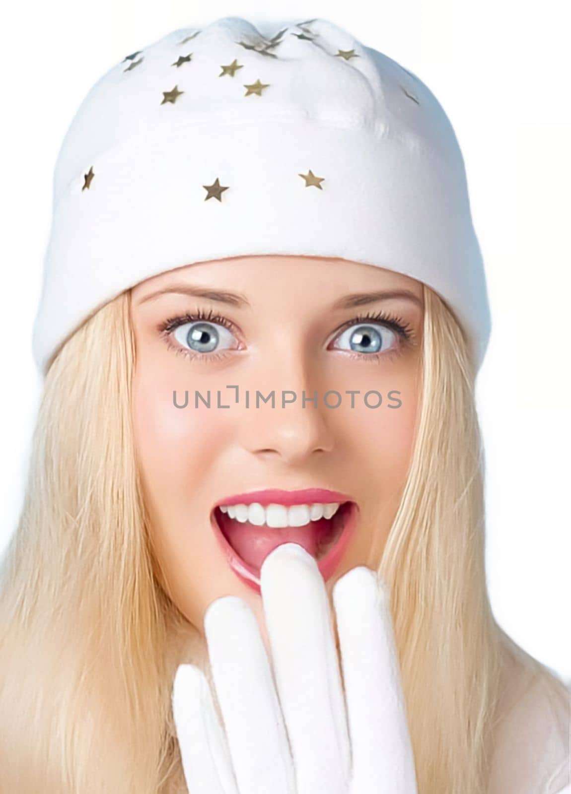 Woman in white hat and gloves, Christmas greetings, and best wishes for the holiday season. Surprised and humorous blonde girl throughout the Christmas, New Year and winter holidays.