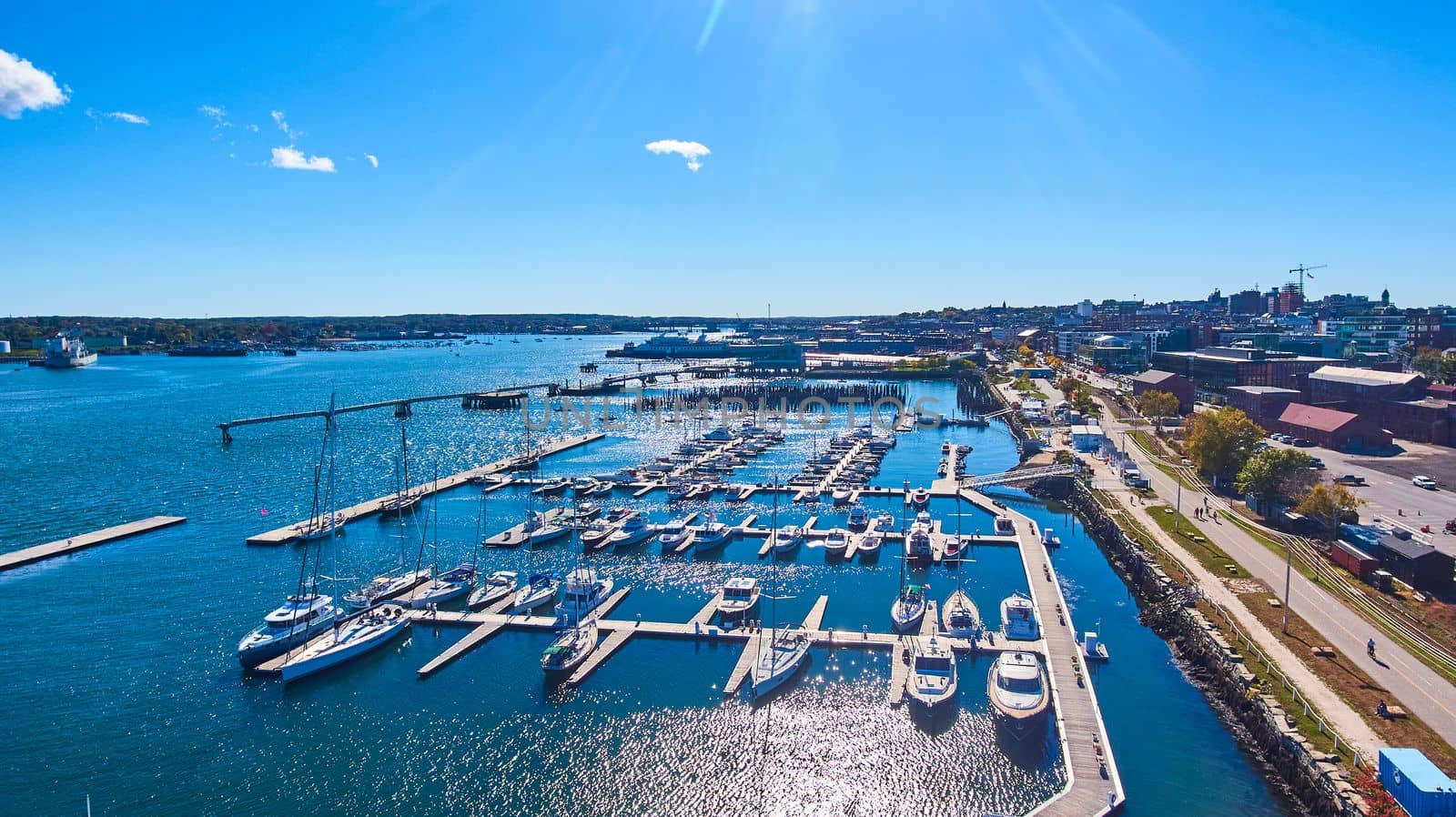 Aerial open view of port filled with boats on Maine coast in Portland by njproductions