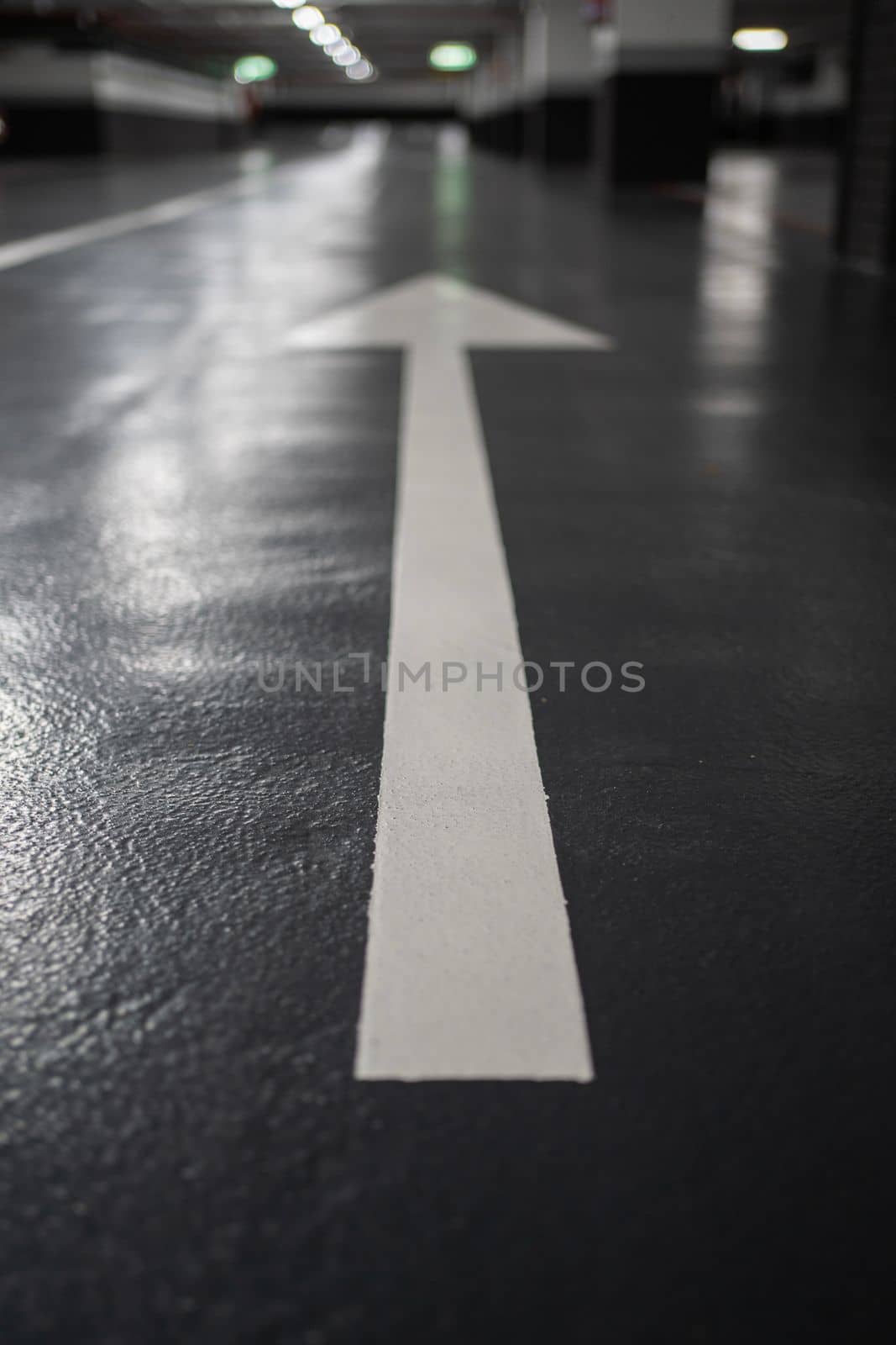 Forward sign on the indoor parking road towards lights by papatonic