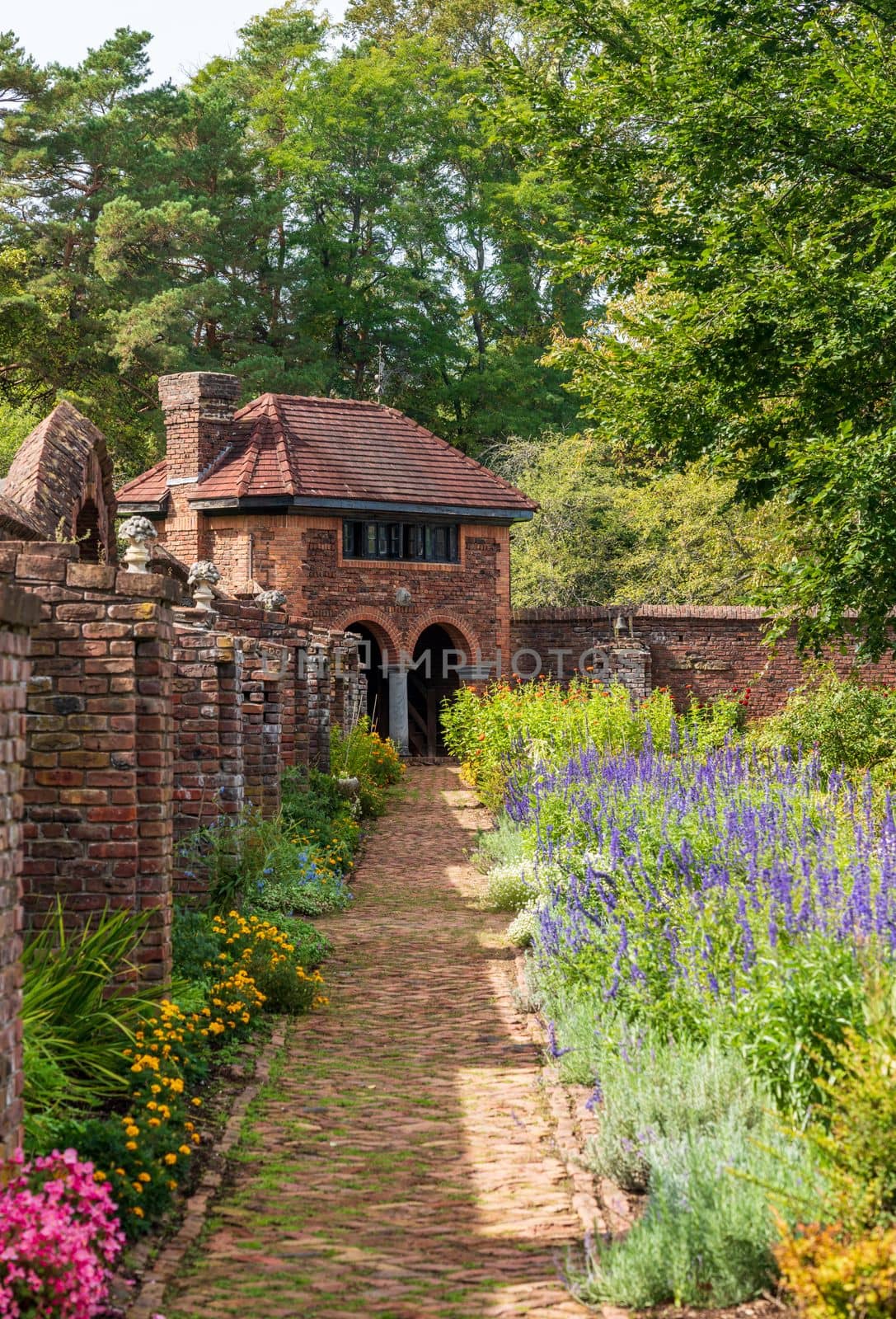 Brick walled garden for vegetables and flowers at Fort by steheap