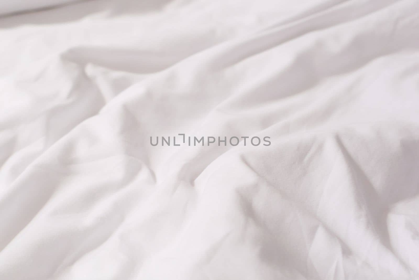Texture of white cotton crumpled fabric. High quality photo