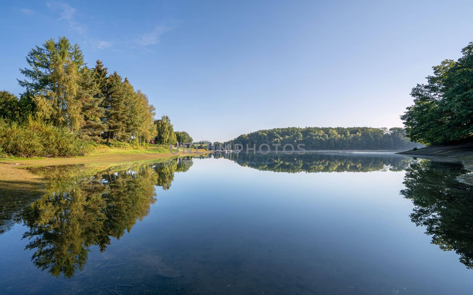 Panoramic image of Bever lake close to Huckeswagen on an early morning during autumn, Bergisches Land, Germany