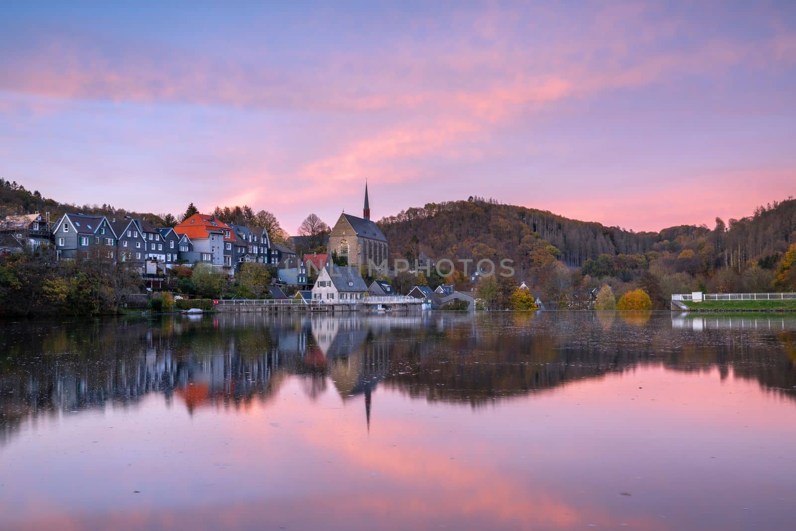 Panoramic image of Beyenburg lake with water reflection and autumnal colors, Wuppertal, Bergisches Land, Germany