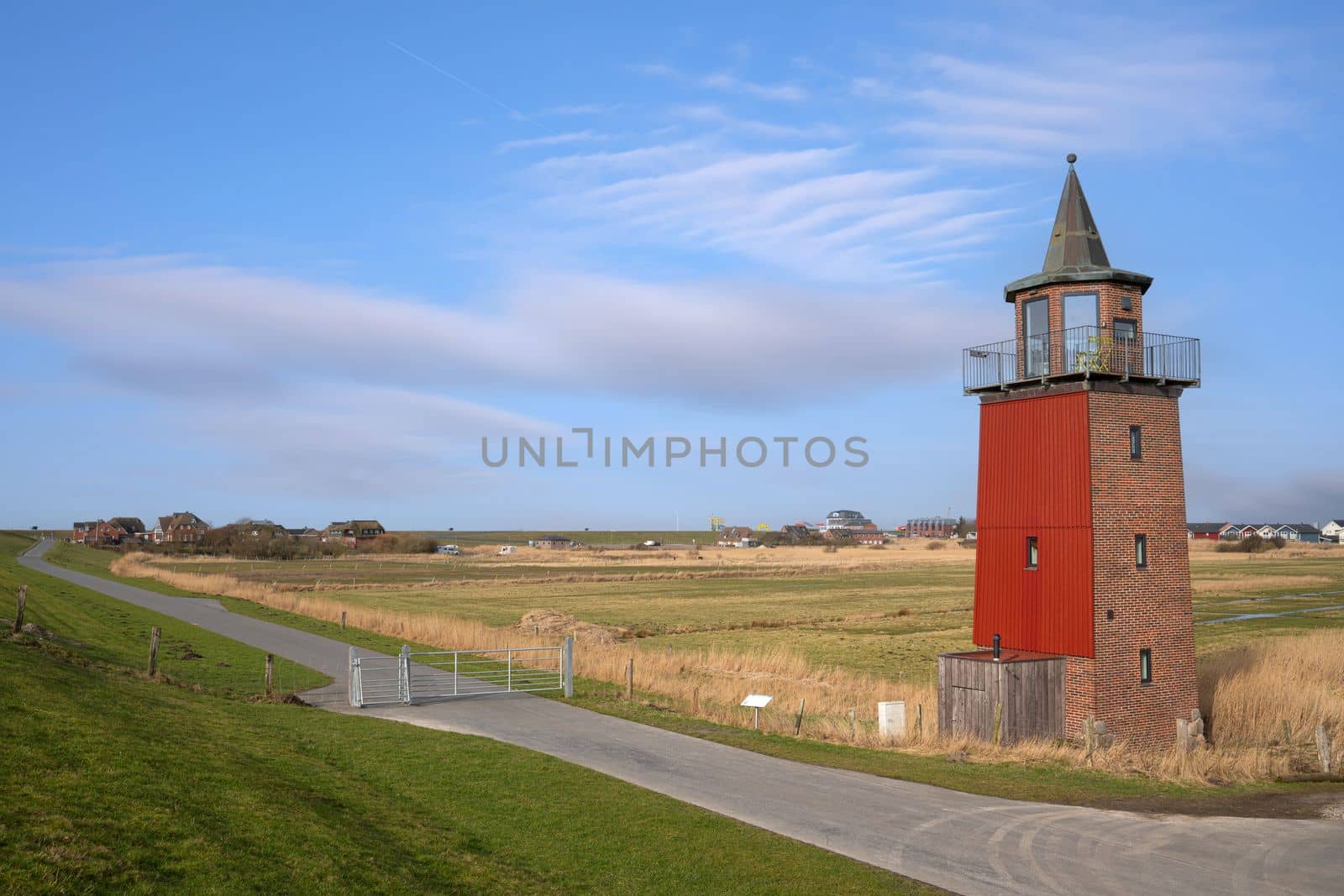 Panoramic image of Dagebuell lighthouse against sky, North Frisia, Germany 