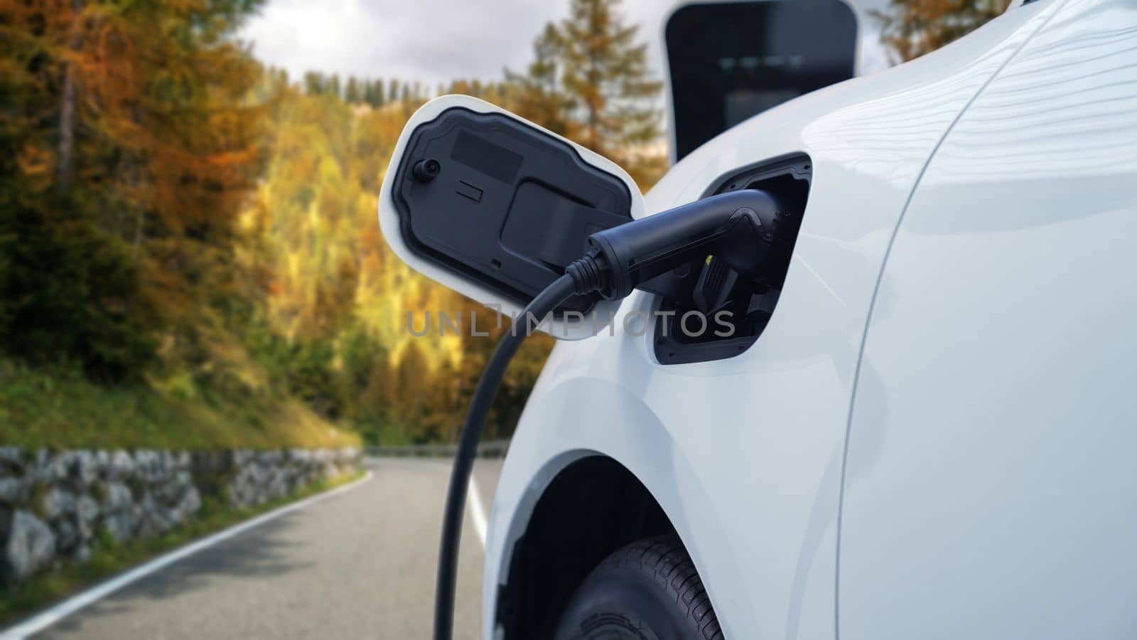 Progressive travel concept of electric vehicle stop to recharge energy from charging station at remote area before reach destination, EV car powered by renewable and clean energy for green environment