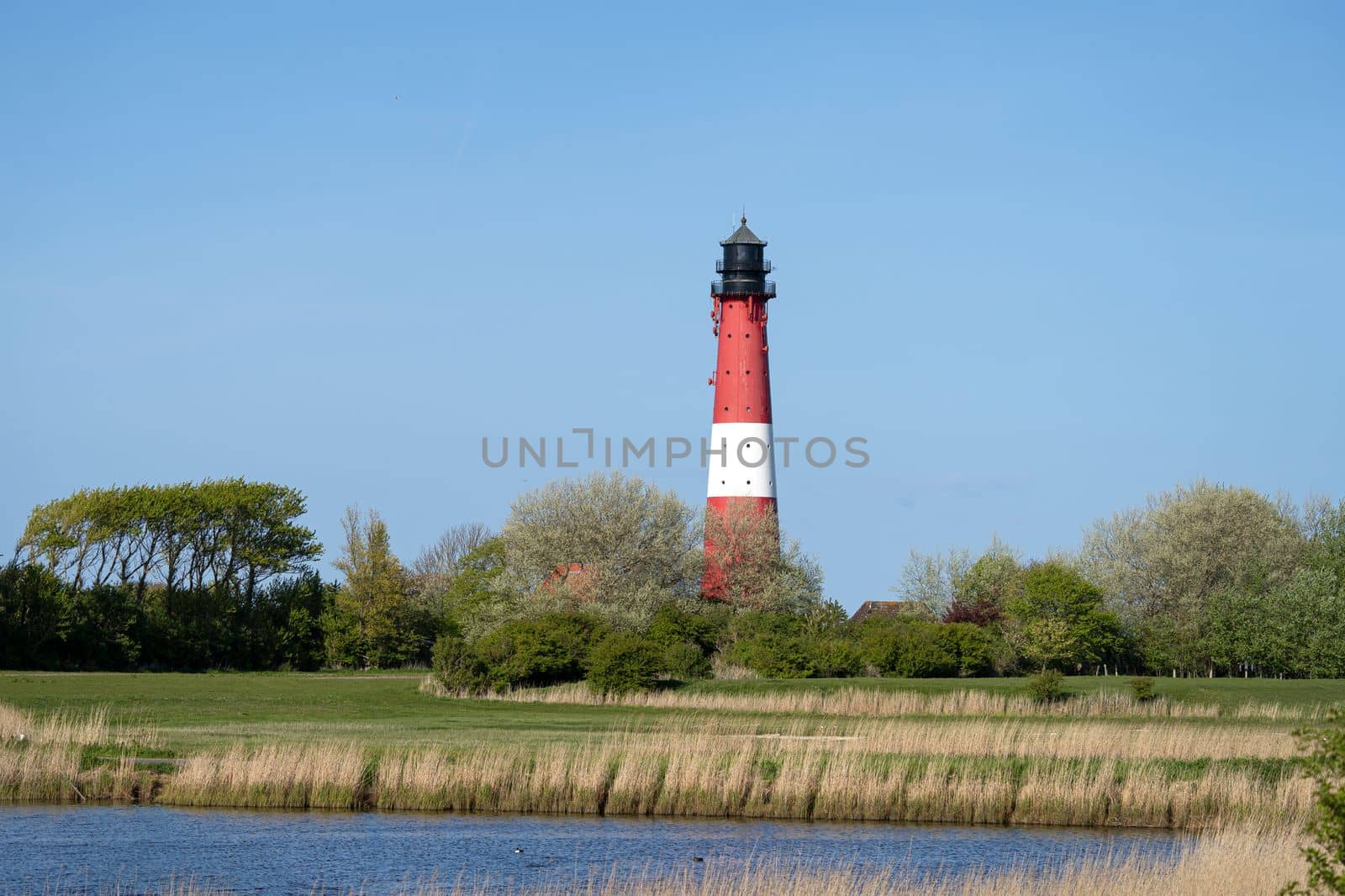 Lighthouse of Pellworm, North Frisia, Germany by alfotokunst
