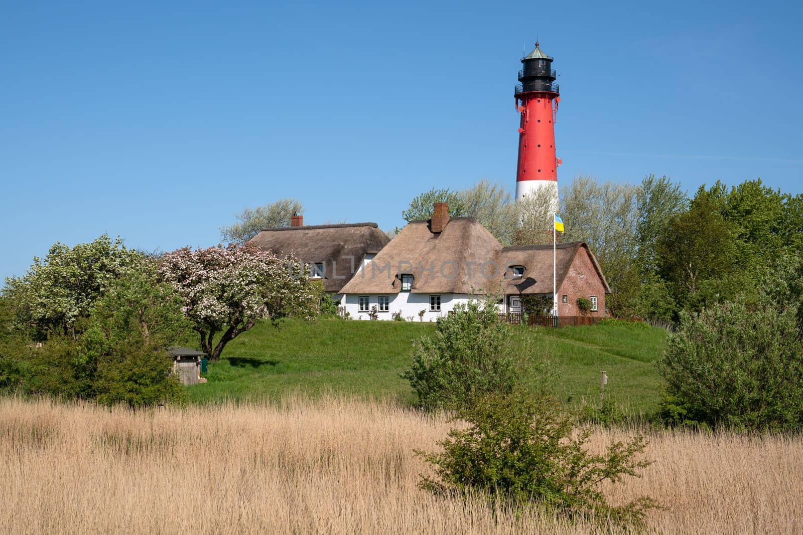 Panoramic image of Pellworm lighthouse against sky, North Frisia, Germany 