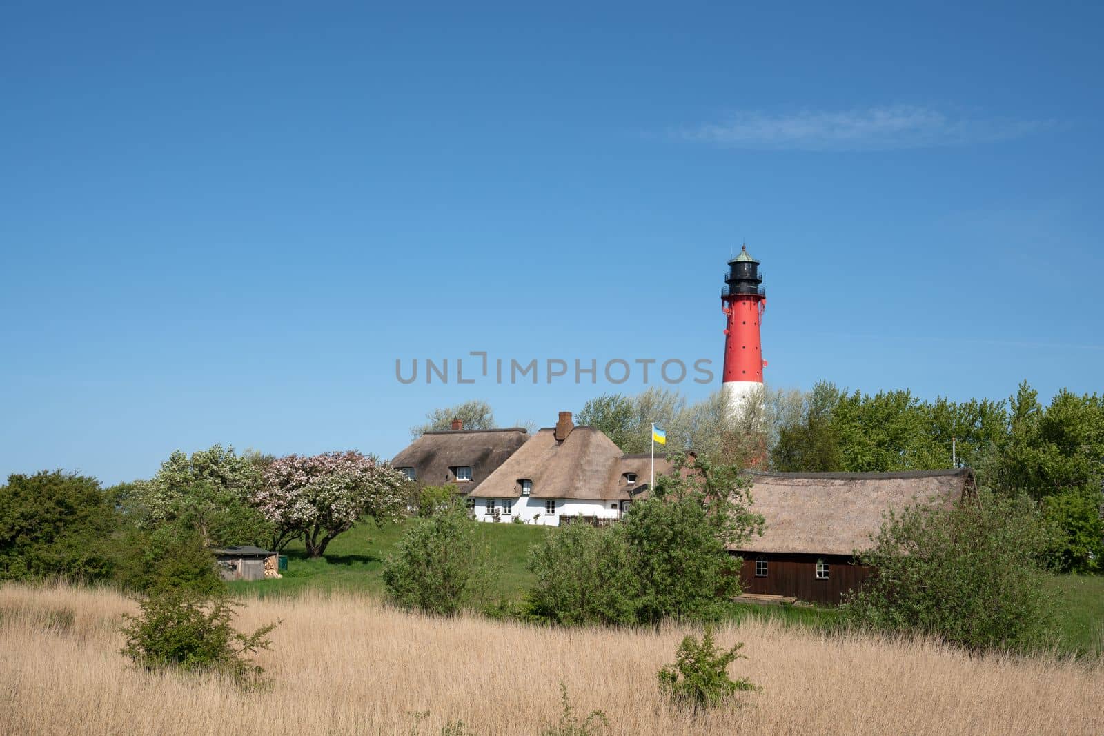 Lighthouse of Pellworm, North Frisia, Germany by alfotokunst