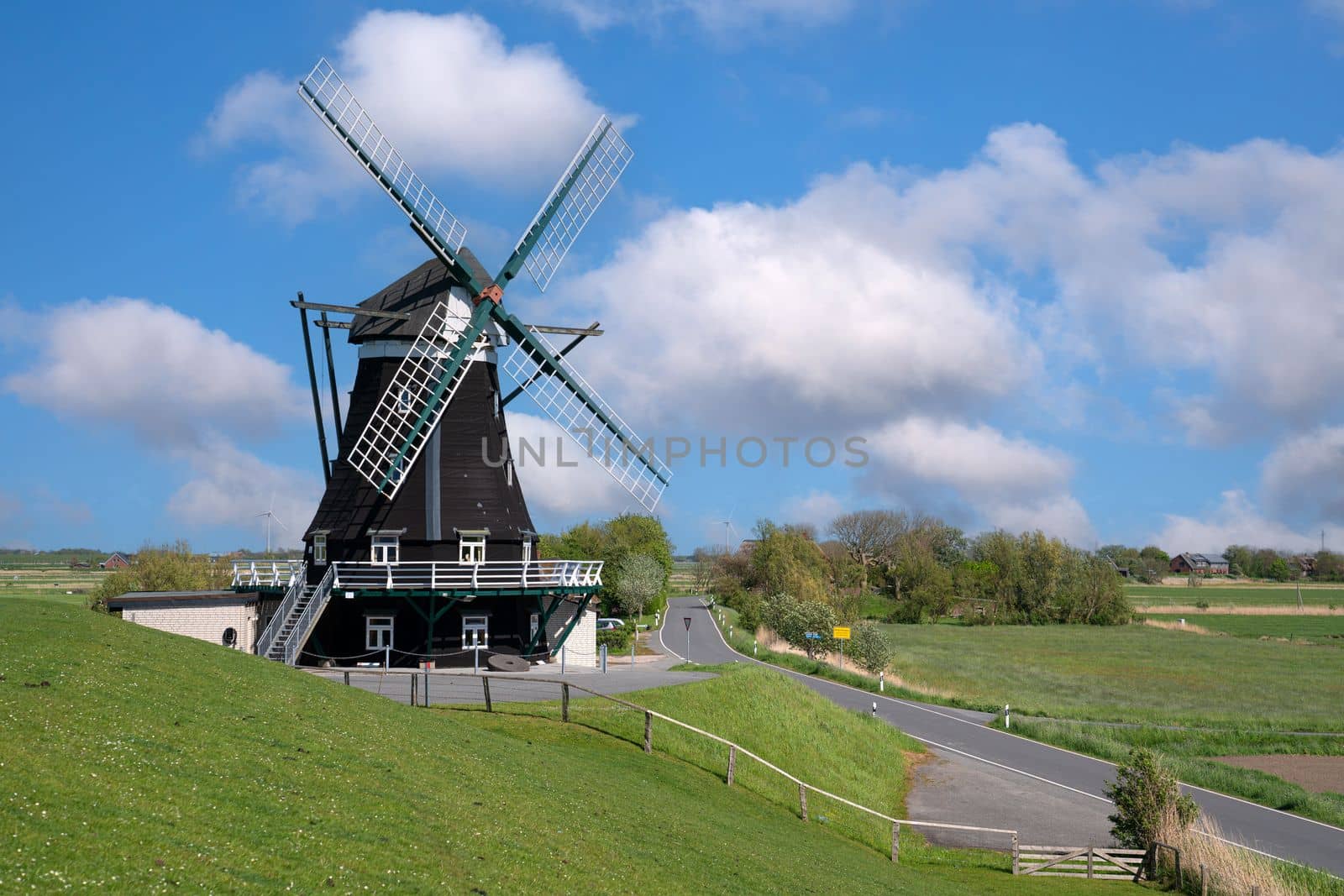 Panoramic image of the windmill of Pellworm against blue sky, North Frisia, Germany