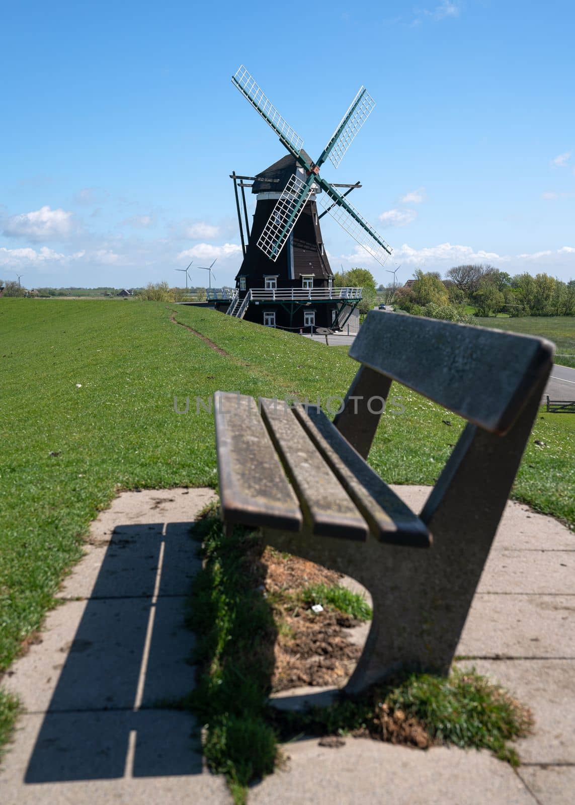 Panoramic image of the windmill of Pellworm against blue sky, North Frisia, Germany