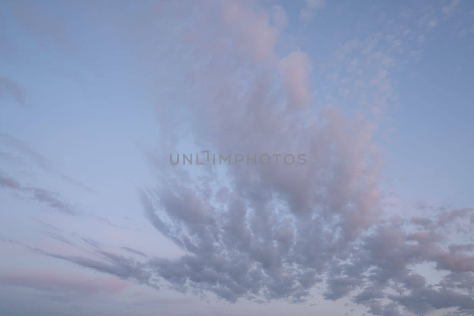 Sky with pastel-colored clouds by alfotokunst