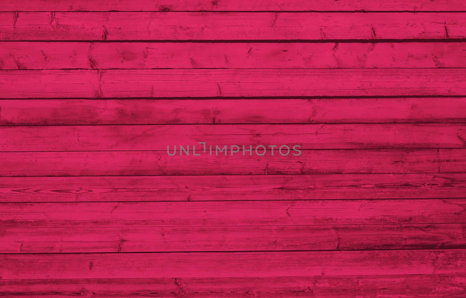 Texture of Viva Magenta wooden boards. Grunge texture old wood. Viva Magenta color wood texture background surface with old natural pattern. Wood texture background, wood planks. Color trendy 2023.