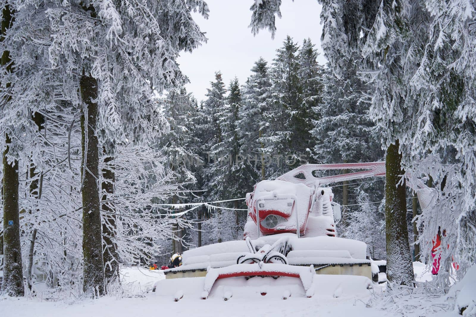 Red snow powder, blower under snow on Wasserkuppe in Rhoen Hesse Germany ski resort on snowy mountain after fresh snow fall. High quality photo