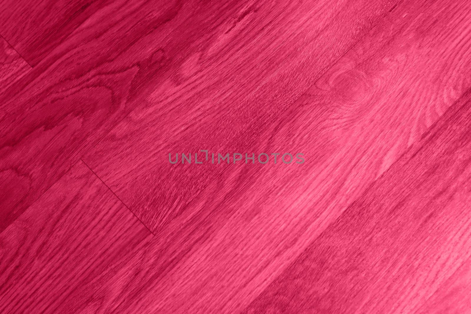 Viva Magenta color wood texture monochrome background. Wood texture with natural pattern. Color of the year 2023. High quality photo