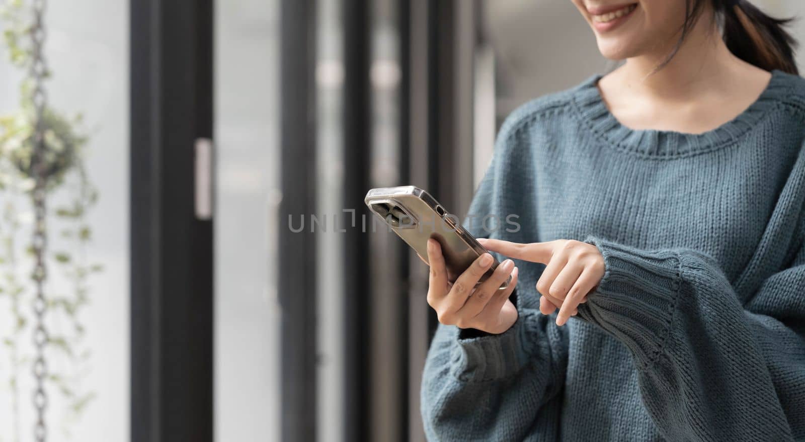 Young Asian beautiful woman using smart phone for business, online shopping, transfer money, financial, internet banking