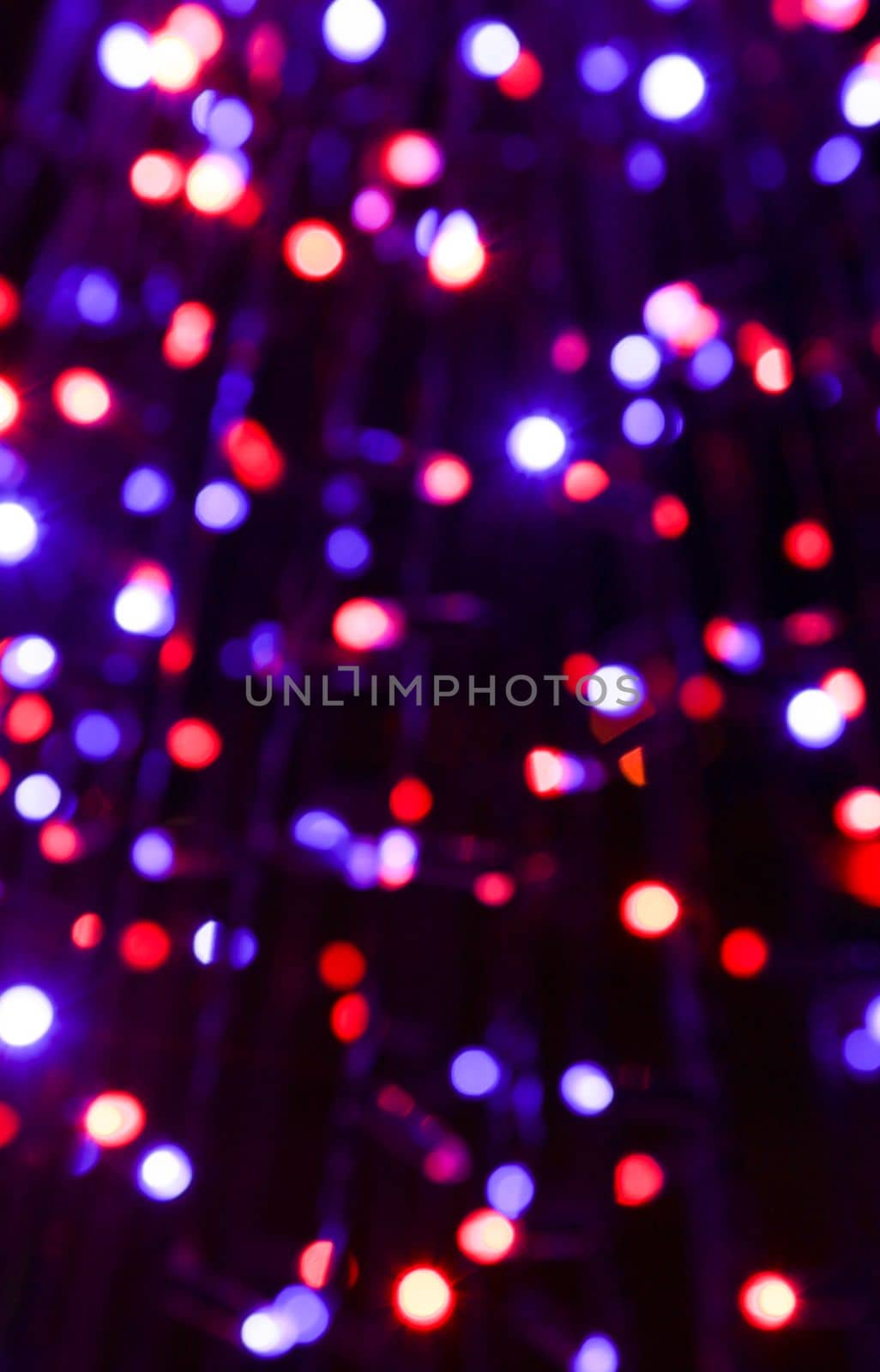 Fragment of holiday illumination made of electric lights.