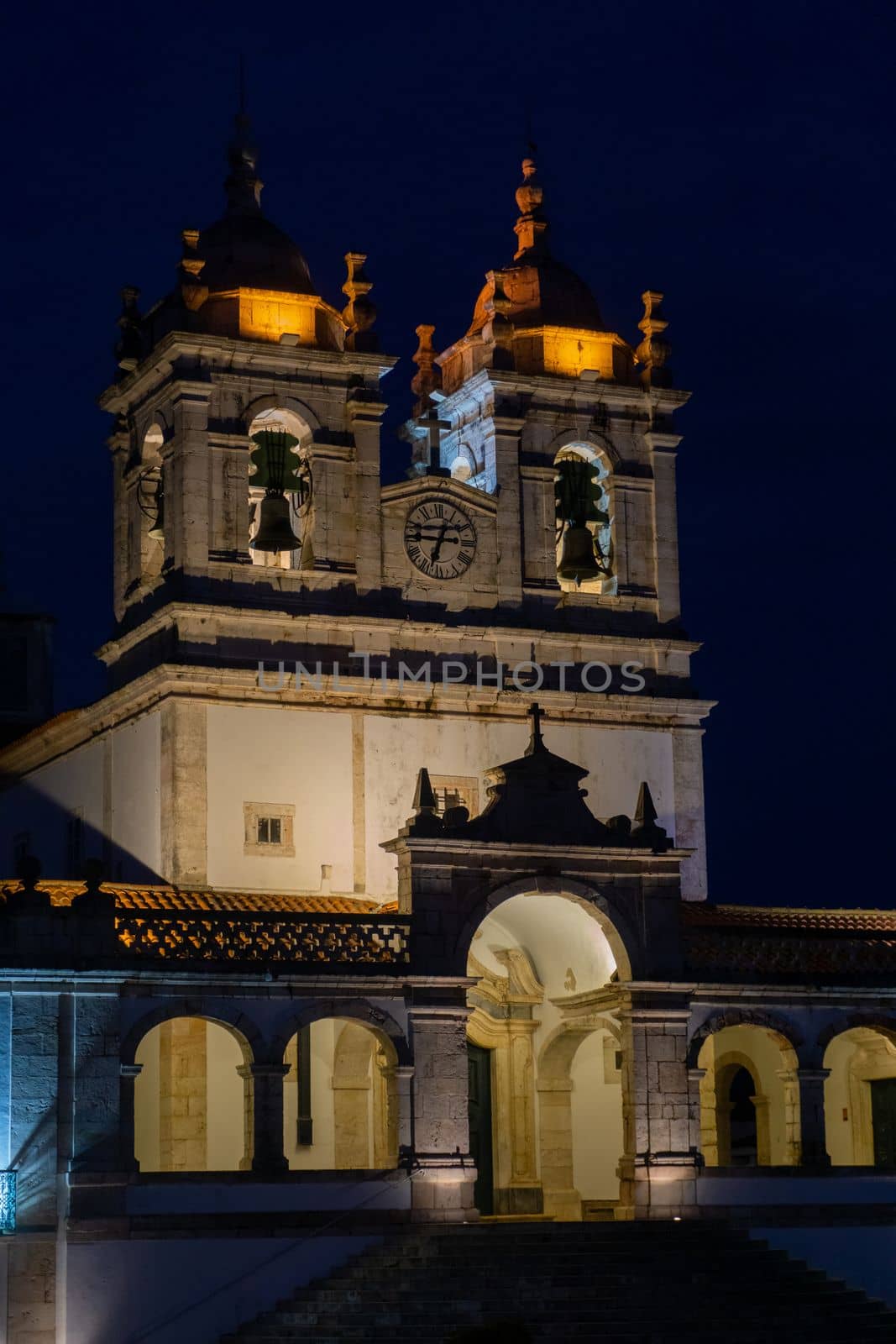 Antique sanctuary of Our Lady of Nazare with lights at night