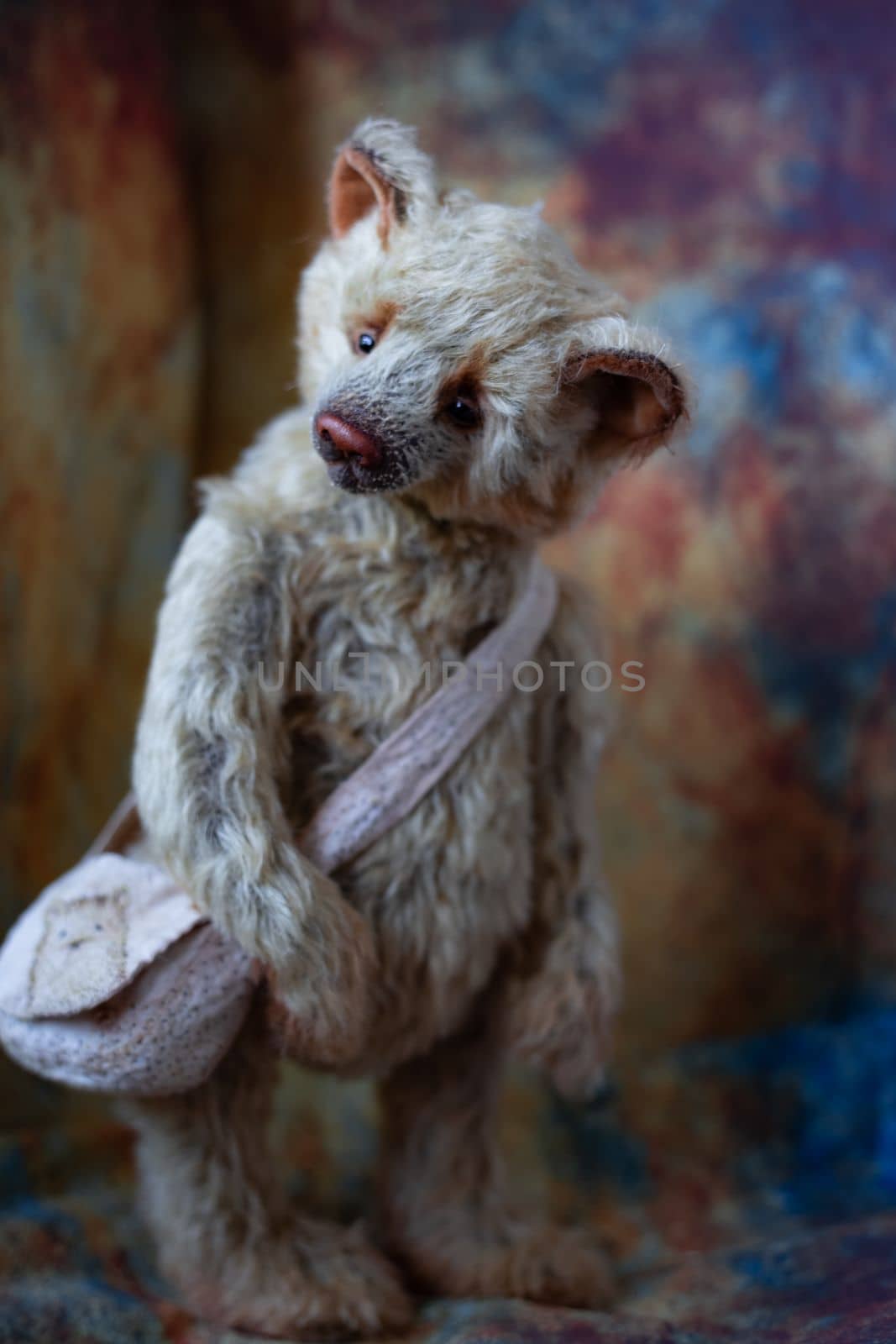 a photo of a handmade collectible teddy bear, suitable for printing in a calendar card or for inserting into a frame for delivering aesthetic pleasure in your free time by Costin