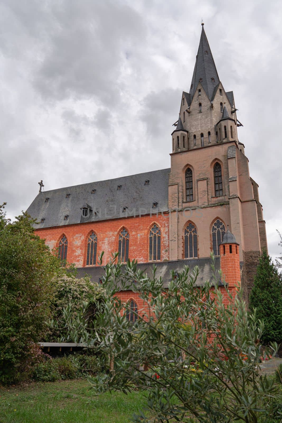 Abbey church of Oberwesel against cloudy sky, Rhine Valley, Germany