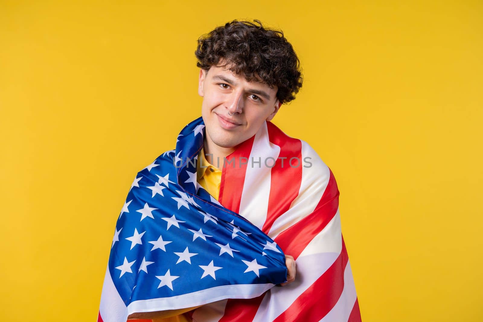 Happy man with national USA flag on yellow background. American patriot, 4th of July - Independence day celebration, election, America, labor. US banner. by kristina_kokhanova