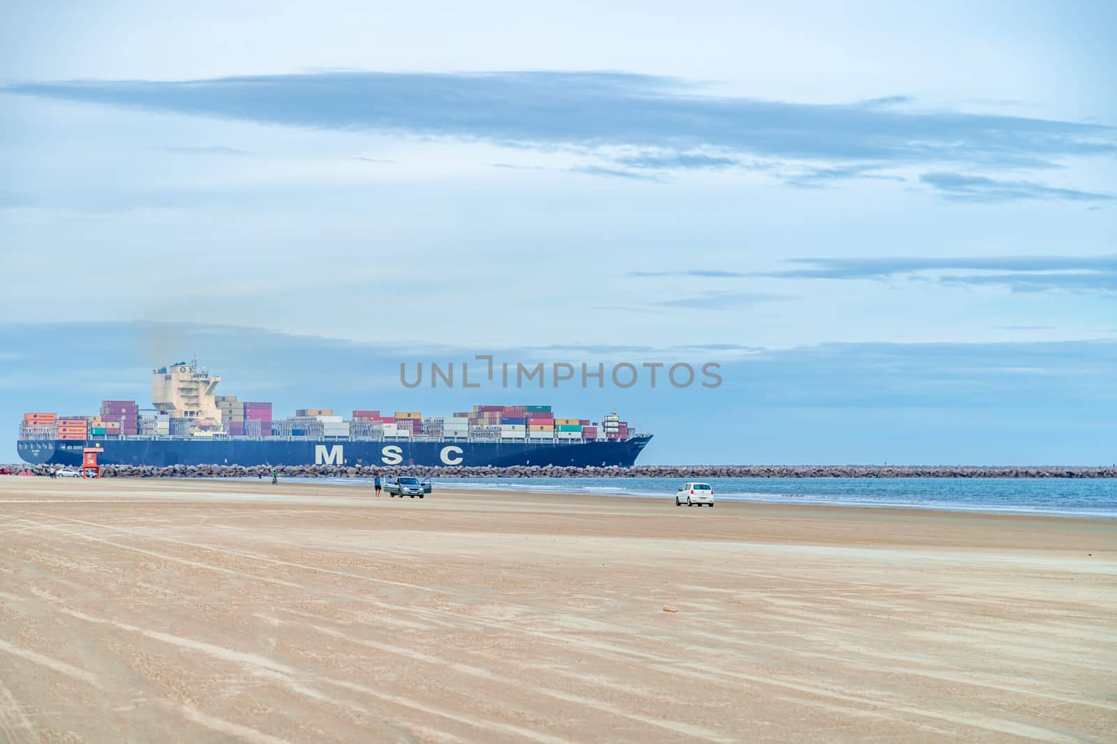 cargo ship at the sandy beach. 