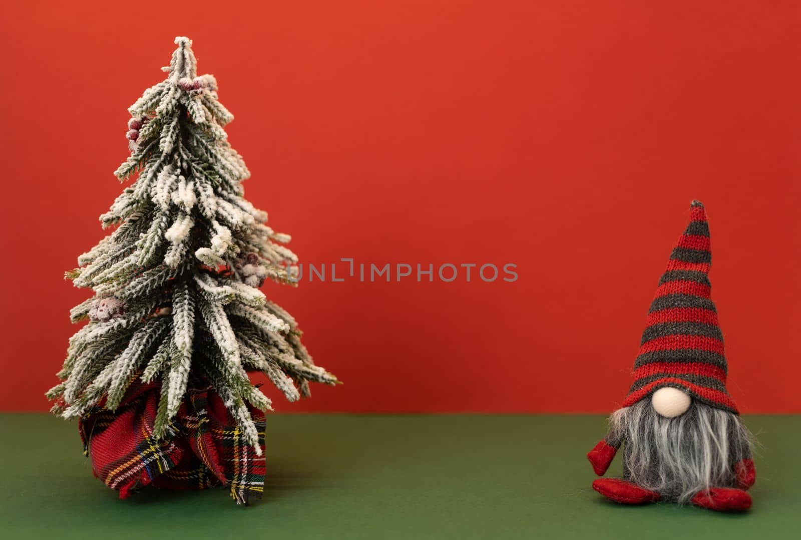 christmas tree and gnome gonk with copy space background. High quality photo