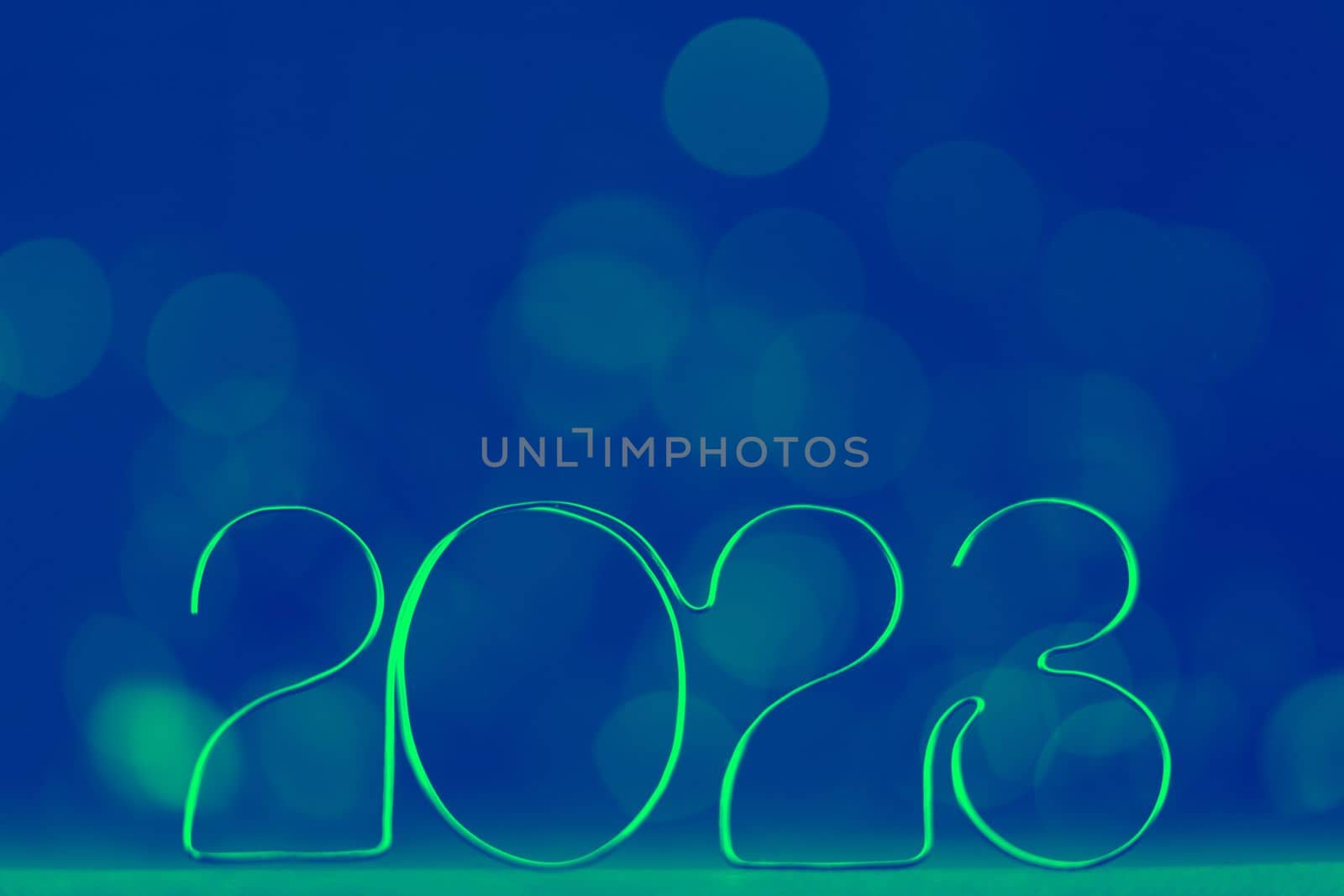 Happy New Year 2023. Beautiful web banner or billboard template with ecological green new year number 2023 on blue background with copy space for text by Costin