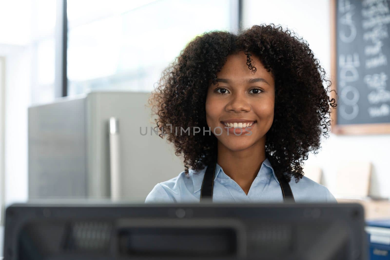Successful Small Business Startup Small business owner SME Beauty Girl standing in front of a coffee shop with her arms crossed. Picture of an Asian female barista cafe owner...