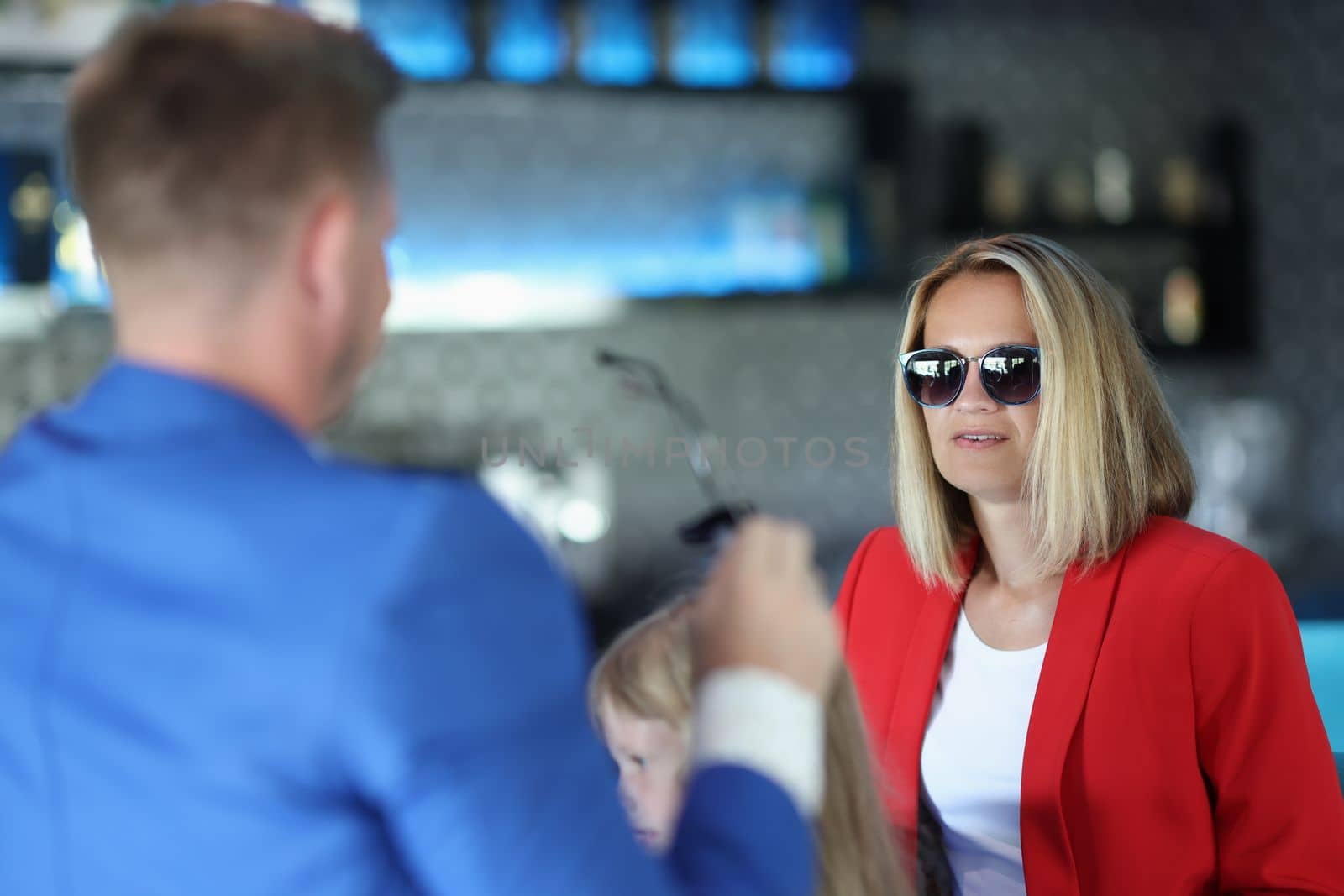 Stylish business man woman communicate in cafe by kuprevich