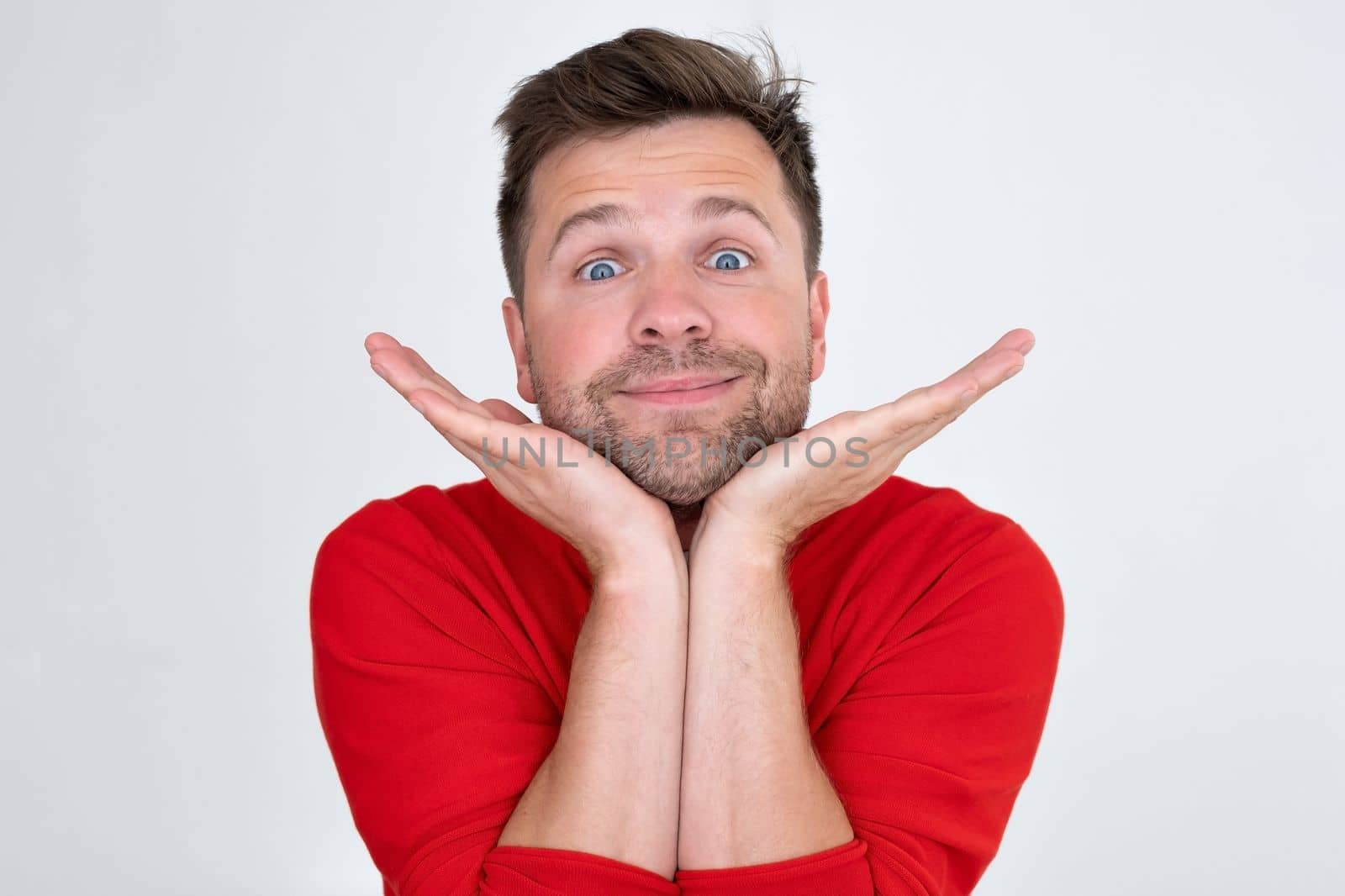 Confident young man looking away dreaming. Funny handsome guy hinking about the future. Closeup face of smiling casual man 