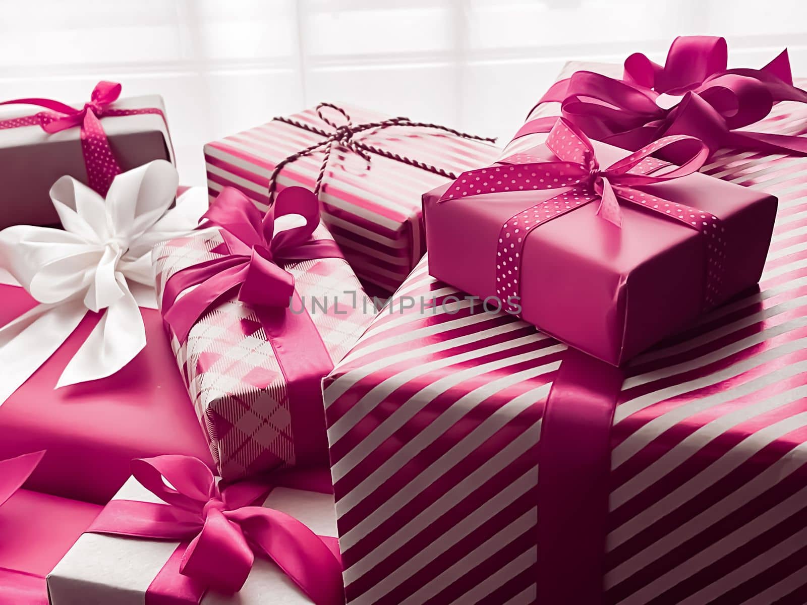 Holiday gifts and wrapped luxury presents, pink gift boxes as surprise present for birthday, Christmas, New Year, Valentines Day, boxing day, wedding and holidays shopping or beauty box delivery concept