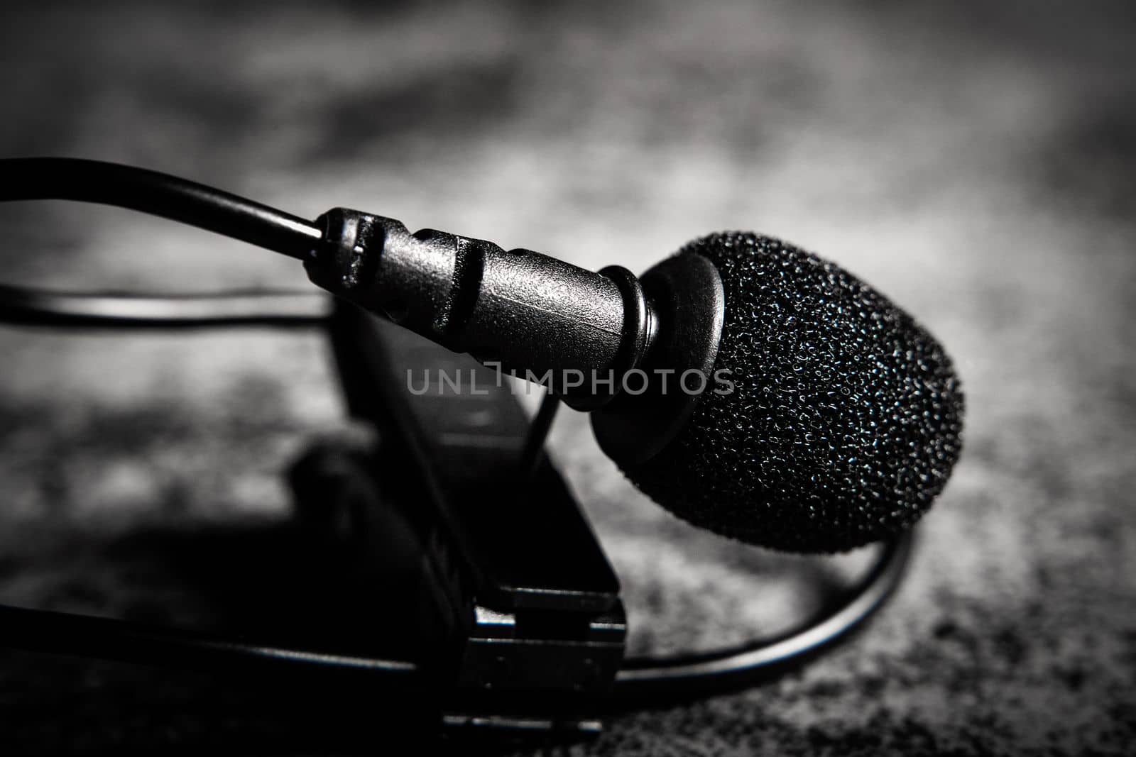 Close-up view of a lavalier microphone. Sound or voice equipment for recording.