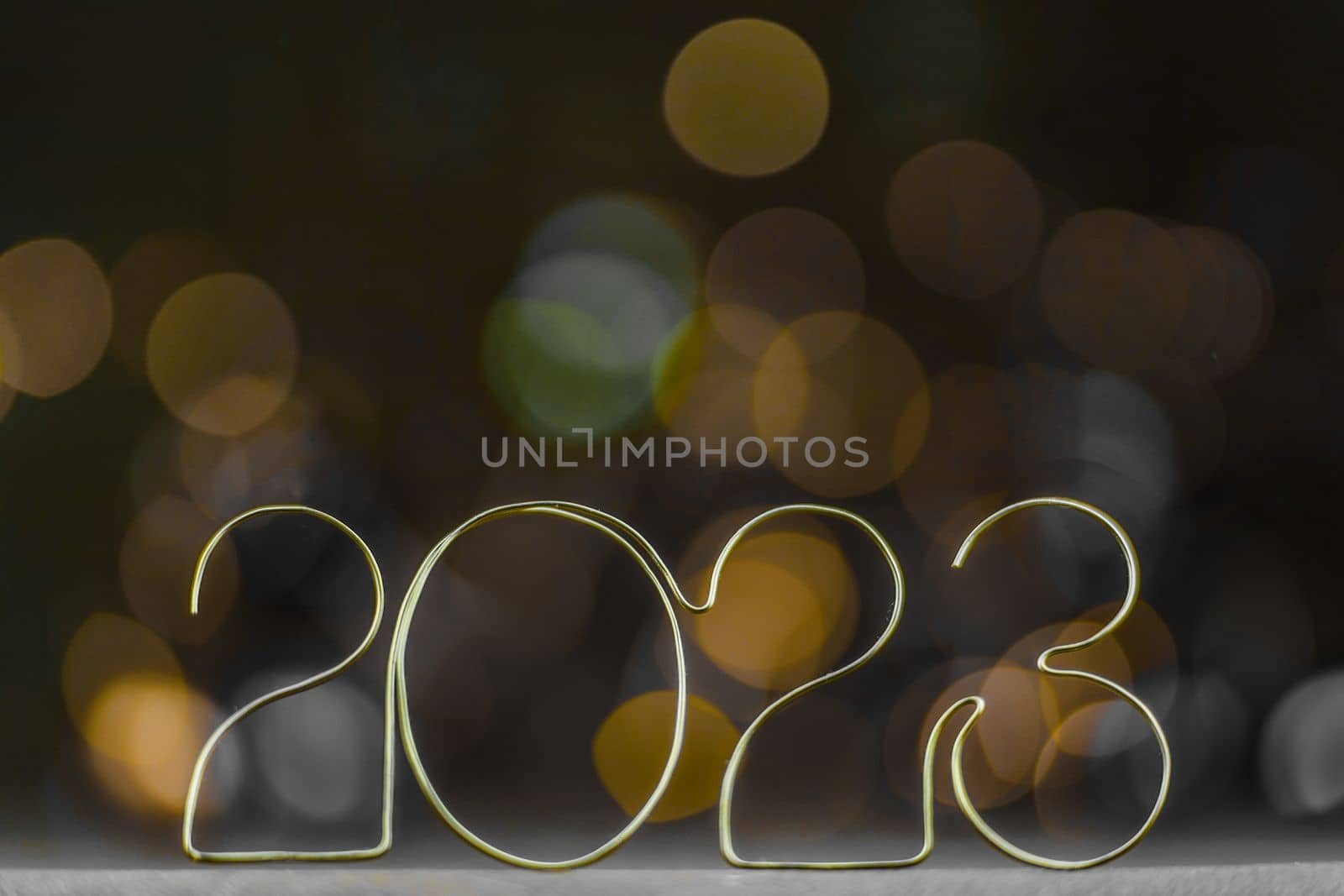 Happy New Year 2023. Beautiful holiday template web banner or billboard with Golden number 2023 on festive background with copy space for text by Costin