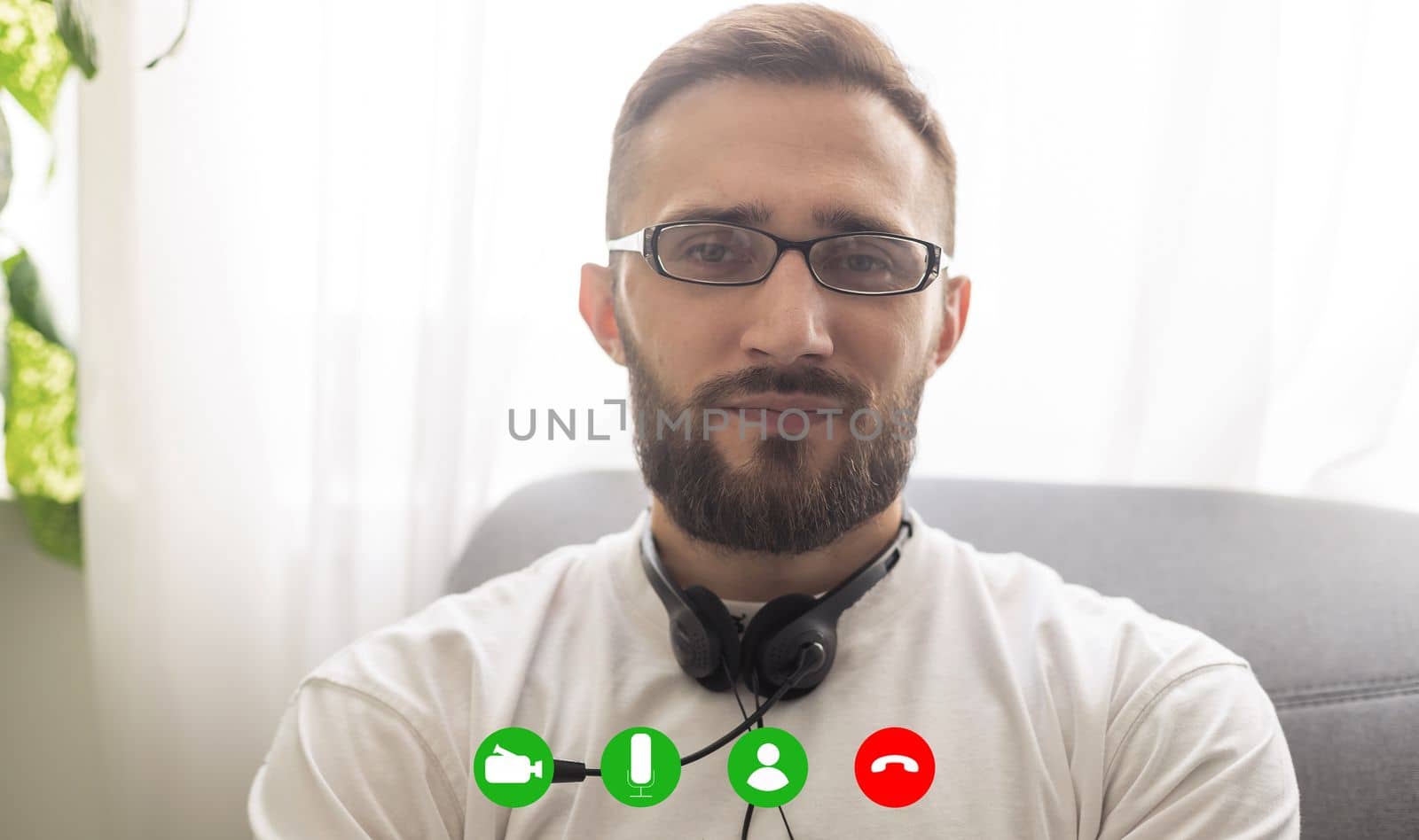 Ask general practitioner online, video call consultation, patient and doctor talk concept. Head shot of mature male therapist share information provide support, laptop screen view, videoconference app by Andelov13
