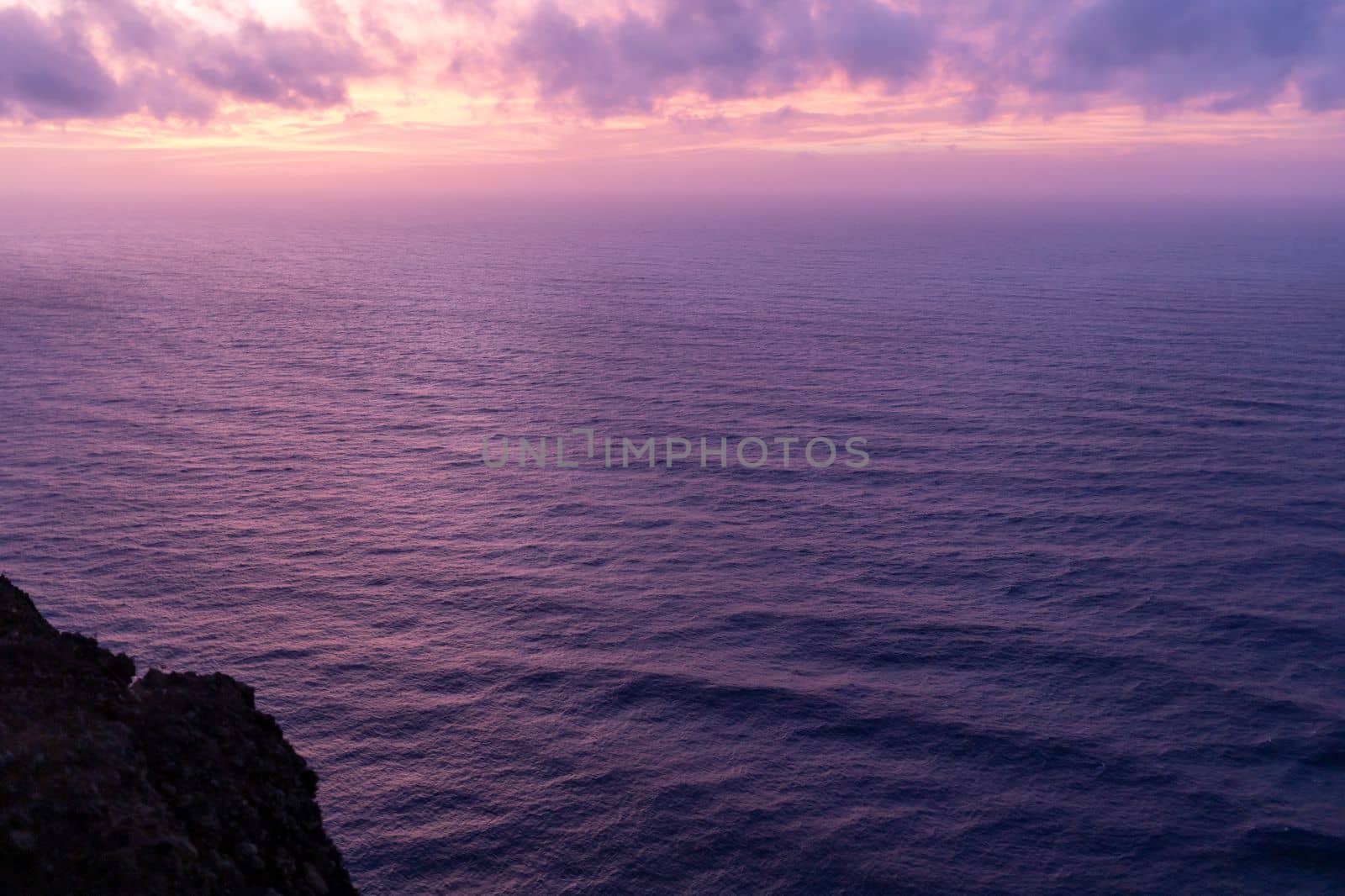 cloudy sunset view over the ocean beautiful background by Chechotkin