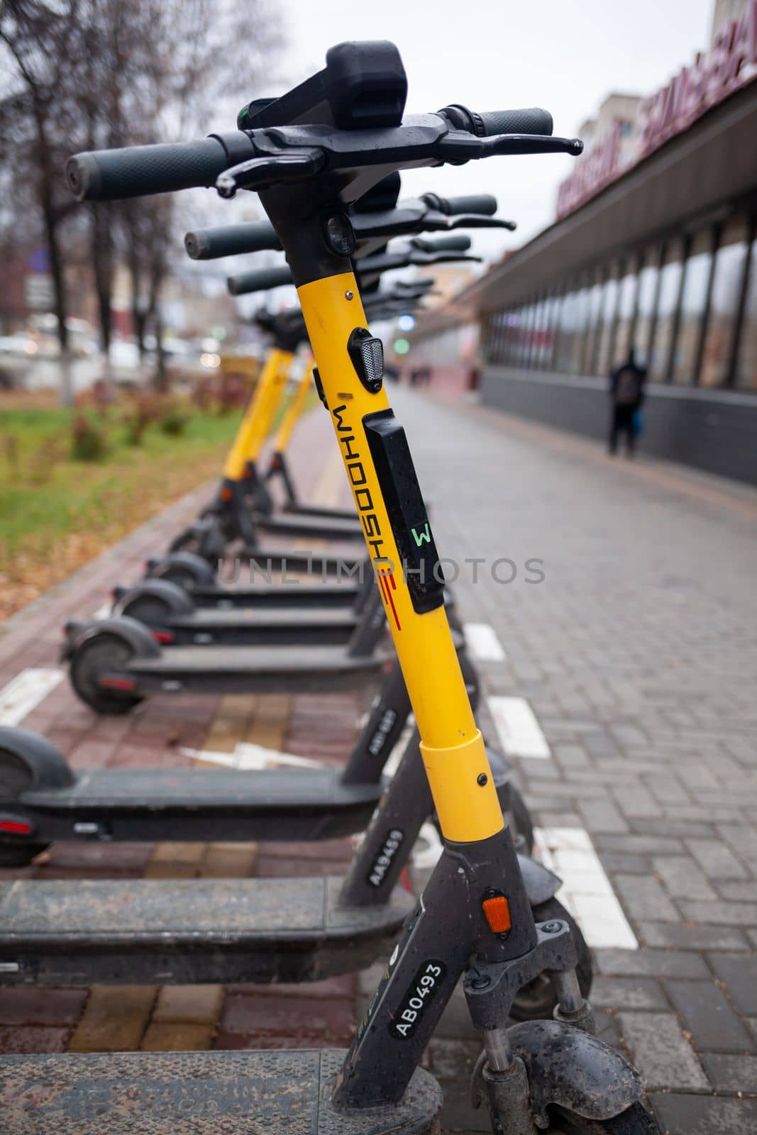 21.10.2022, Tomsk, Russia. Electric scooters for Public Use, Standing on a city street, Public mobile Transport. Electric scooters for rent, for rent An electric scooter is an economical vehicle 