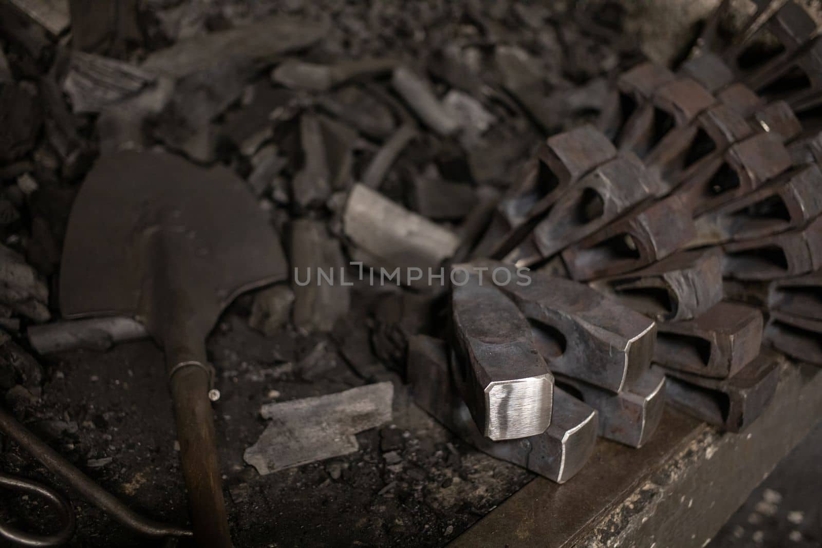 blacksmith tools and metal blanks in privet forge by Chechotkin