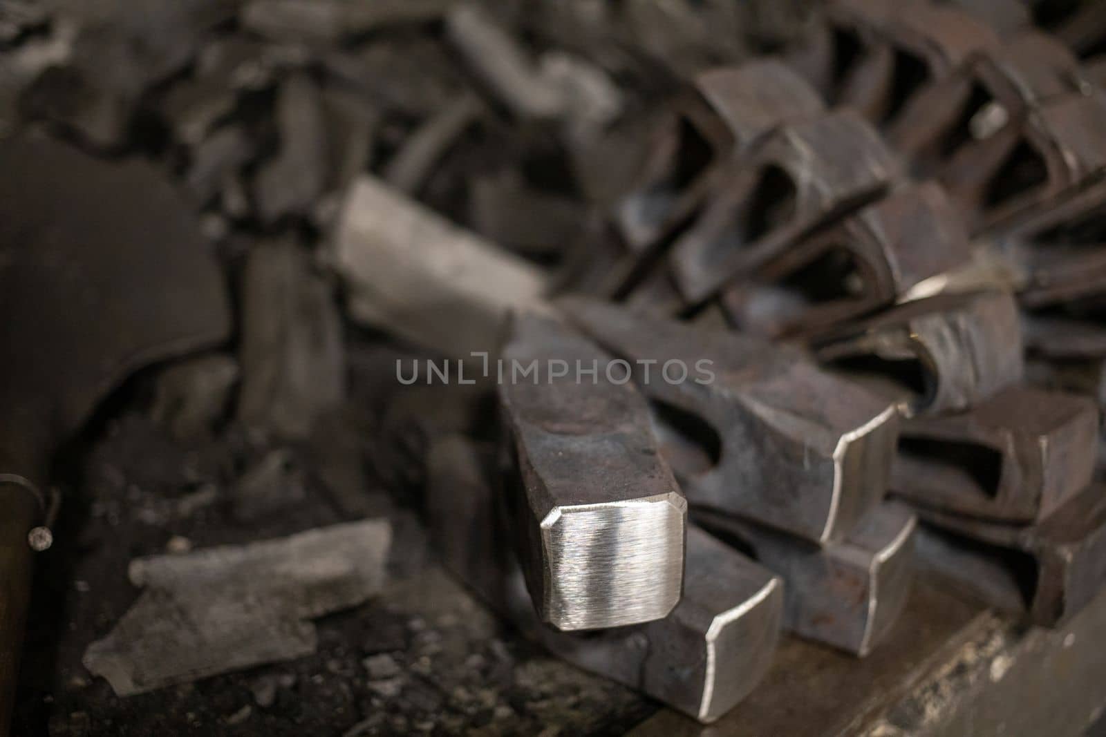 blacksmith tools and metal blanks in privet forge by Chechotkin