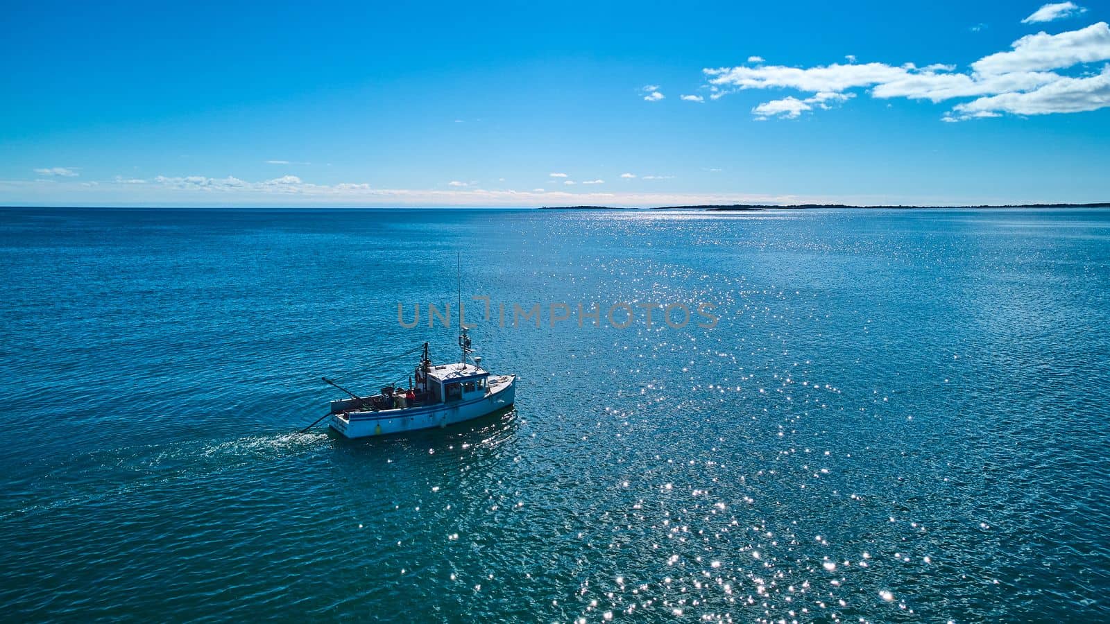 Fishing boat for lobster and clams on Maine ocean by njproductions